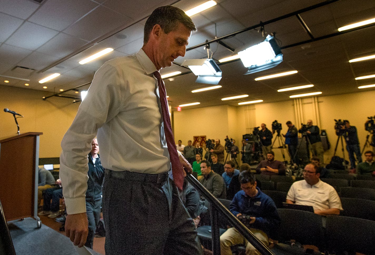 University of Minnesota athletic director Mark Coyle walked off the stage after addressing the media after the firing of Gophers football coach Tracy Claeys. ] CARLOS GONZALEZ cgonzalez@startribune.com - January 3, 2017, Minneapolis, MN, TCF Bank Stadium, University of Minnesota Football head coach, Tracy Claeys fired. MINNEAPOLIS, MN (Jan. 3, 2017) � University of Minnesota Athletics Director Mark Coyle today relieved Gophers football coach Tracy Claeys of his duties, along with most of the res