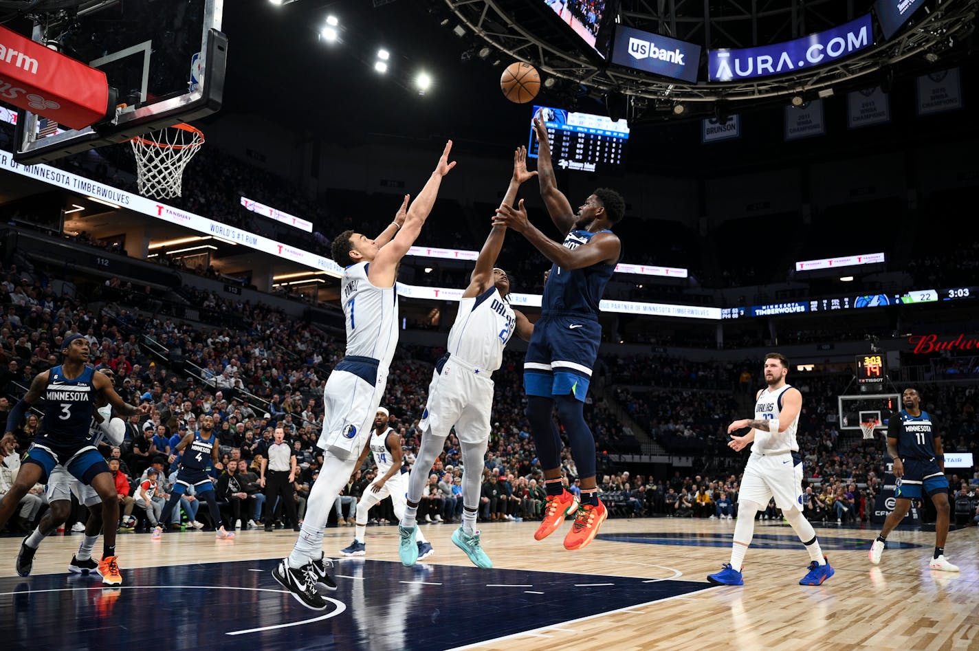 Minnesota Timberwolves guard Anthony Edwards (1) scores a basket against the Dallas Mavericks during the first half Wednesday, Dec. 21, 2022 at Target Center in Minneapolis, Minn... ] AARON LAVINSKY • aaron.lavinsky@startribune.com