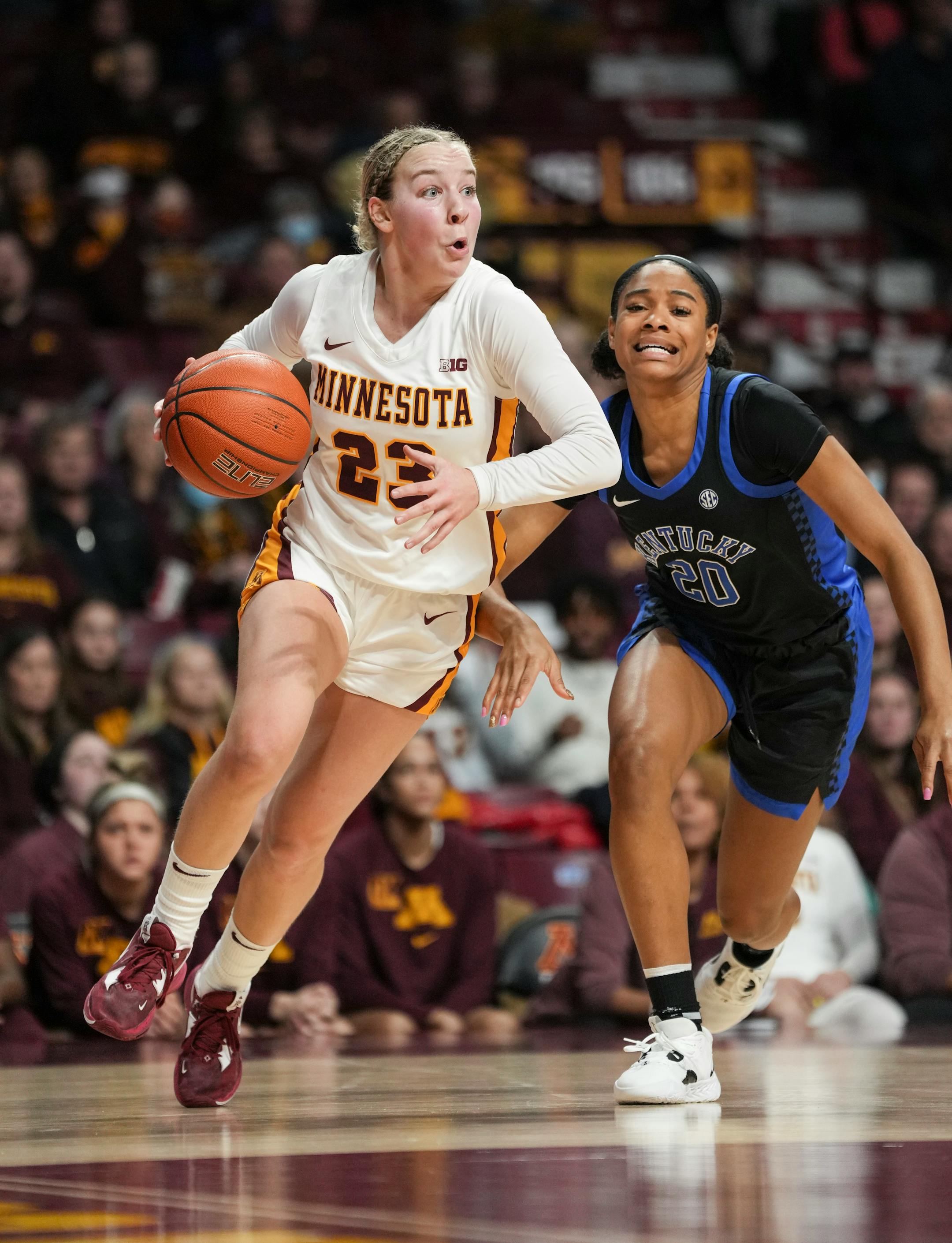 Minnesota Gophers guard Katie Borowicz (23) dribbles with the ball in the second half.