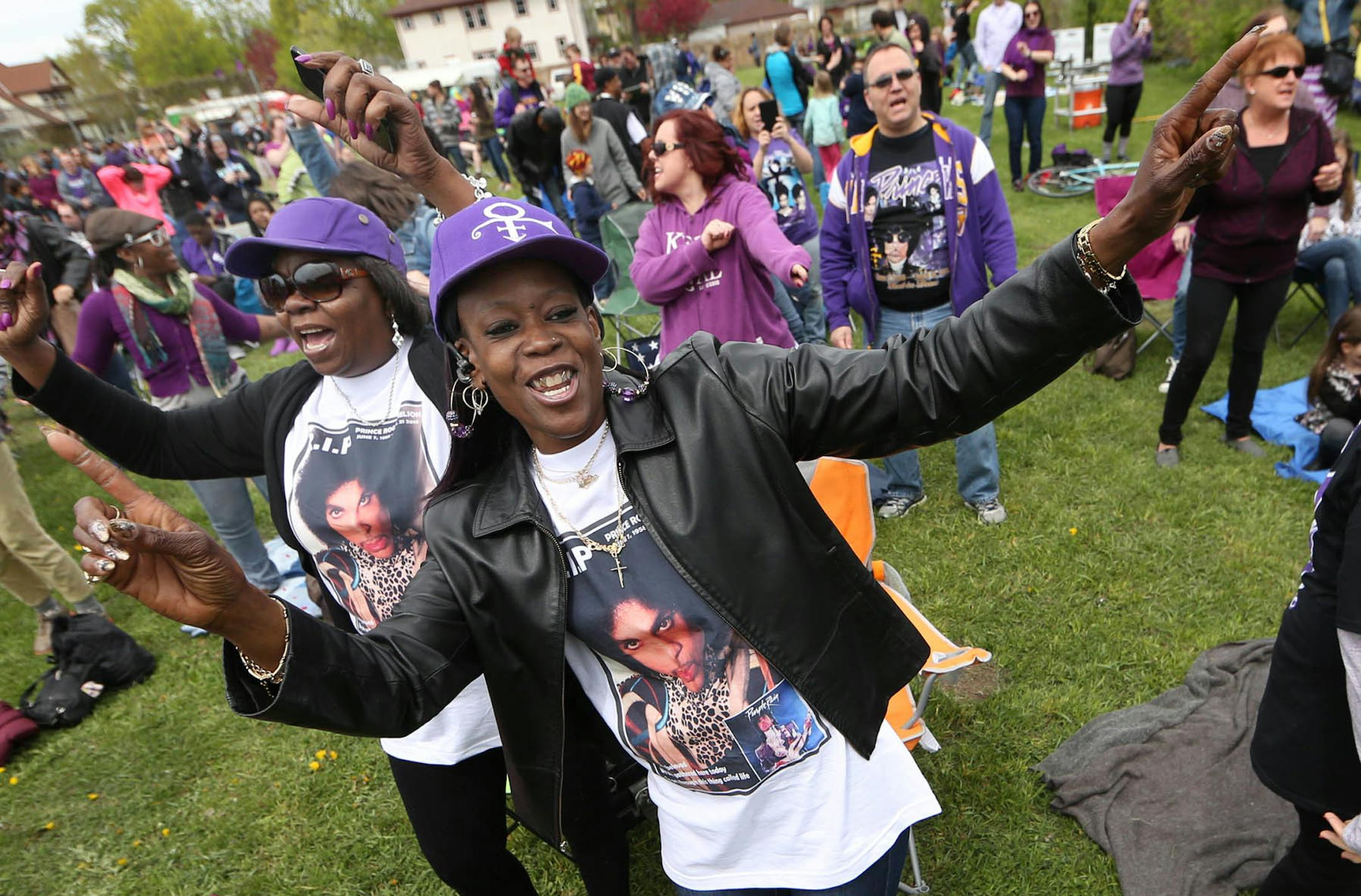 Mary Riley (left) and Cindy Durr danced to Prince music.] JIM GEHRZ ï james.gehrz@startribune.com / Minneapolis, MN / April 30, 2016 /1:00 PM ñ BACKGROUND INFORMATION: Saturday, April 30; 1-6 pm: Prince Block Party at Sabathani Community Center. The event will feature Prince-inspired musicians, Ray Seville as DJ and of course, music by Prince, plus magicians, bounce houses, puppeteers and more family fun! The event is family-friendly and free and open to the public. Attendees are encou