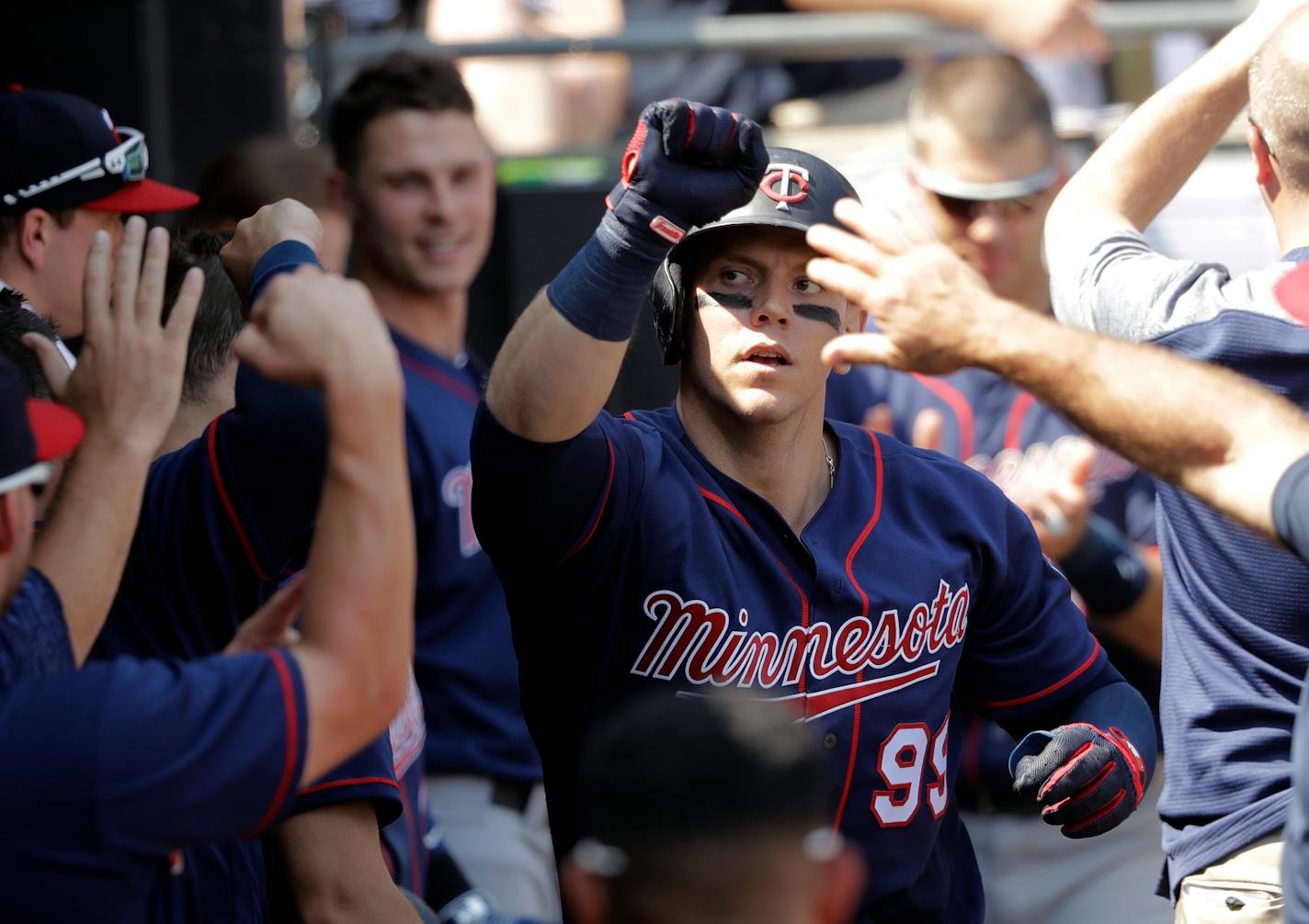 Logan Morrison celebrates his home run off White Sox starting pitcher Lucas Giolito, in the seventh inning