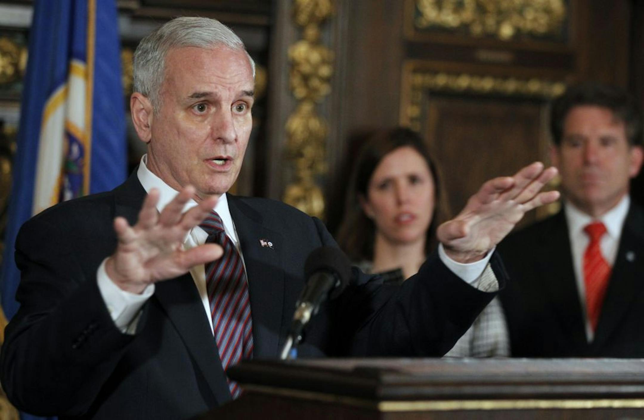 At the governor's reception room at the State Capitol, Governor Mark Dayton and Secretary of State Mark Ritchie held a press conference for an alternative to voter ID: electronic poll books that could verify voters' identities.