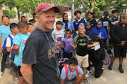 Whittier School’s Jeff “Nacho” Carlson posed with some of his summer Waterways participants and counselors.