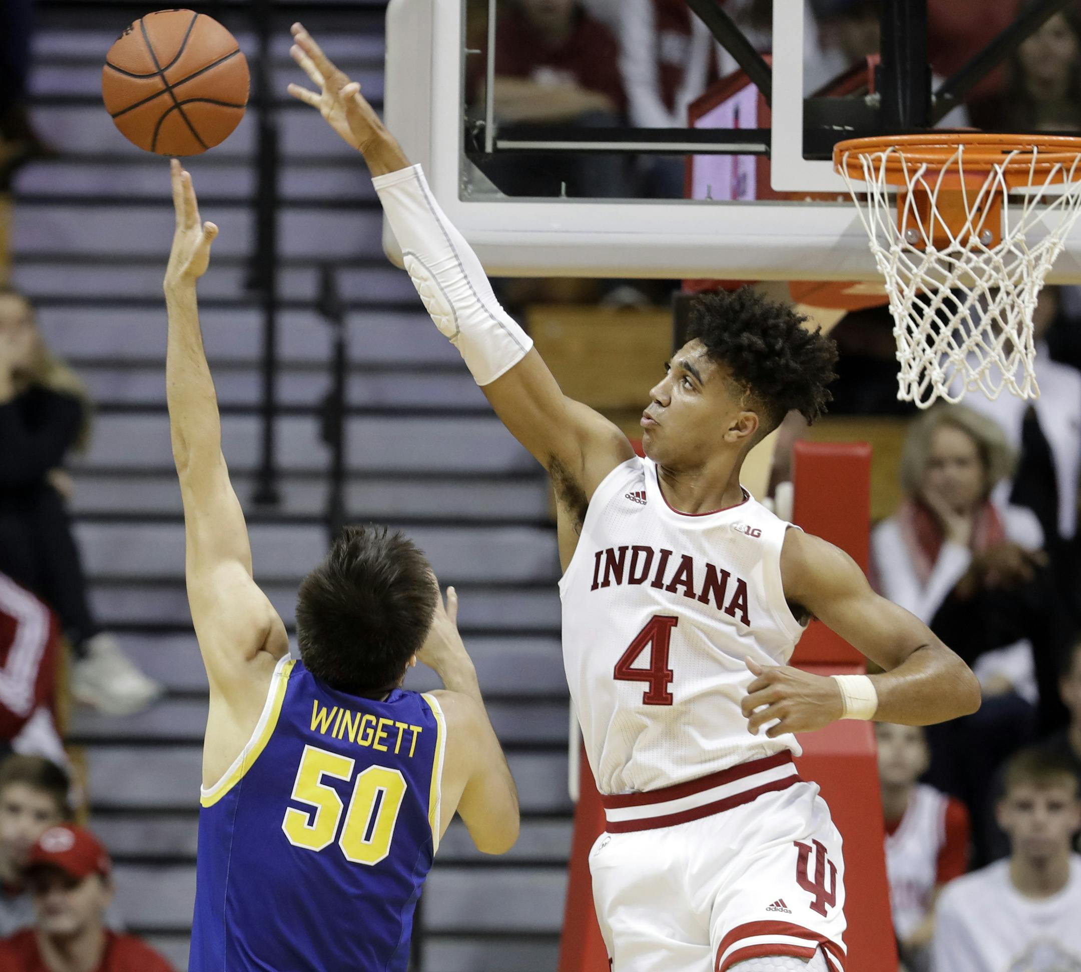 South Dakota State's David Wingett (50) has his shot blocked by Indiana's Trayce Jackson-Davis (4) during the first half of an NCAA college basketball game, Saturday, Nov. 30, 2019, in Bloomington, Ind. (AP Photo/Darron Cummings)
