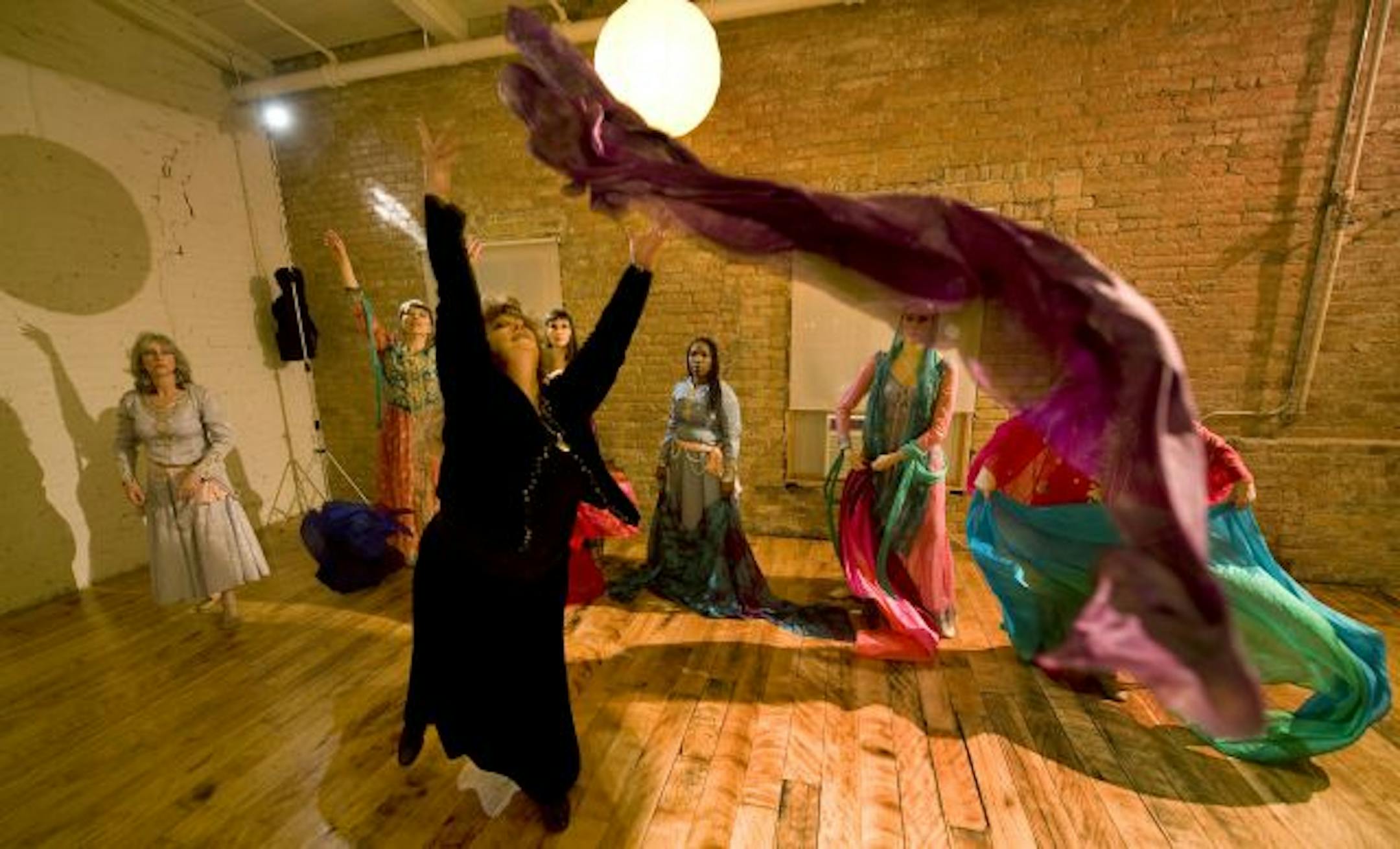 Laurel Victoria Gray, artistic director of the Silk Road Dance Company of Washington, D.C., worked with a group of dancers practicing for the St. Thomas Sacred Arts Festival. Leili Tajadod Pritschet had asked Gray to collaborate on her work, "Hidden Yearning."