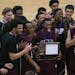 St. Paul Johnson celebrated their 85-78 win over Hill-Murray in the Class 3A, Section 4, boys' basketball final at Washington Tech Magnet School, Thur
