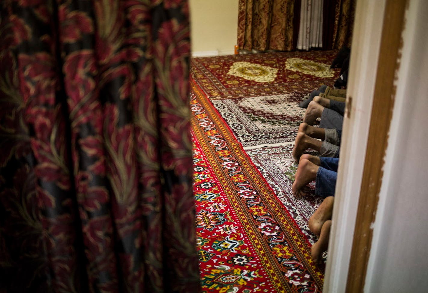 Muslims praying at the Islamic Center in Fort Morgan, Colo., Feb. 27, 2016. After top managers said that religious breaks would be severely curtailed, dozens of employees walked out of the Cargill Meat Solutions plant in December thrusting the livelihoods and the fate of a business into limbo. (Nick Cote/The New York Times)