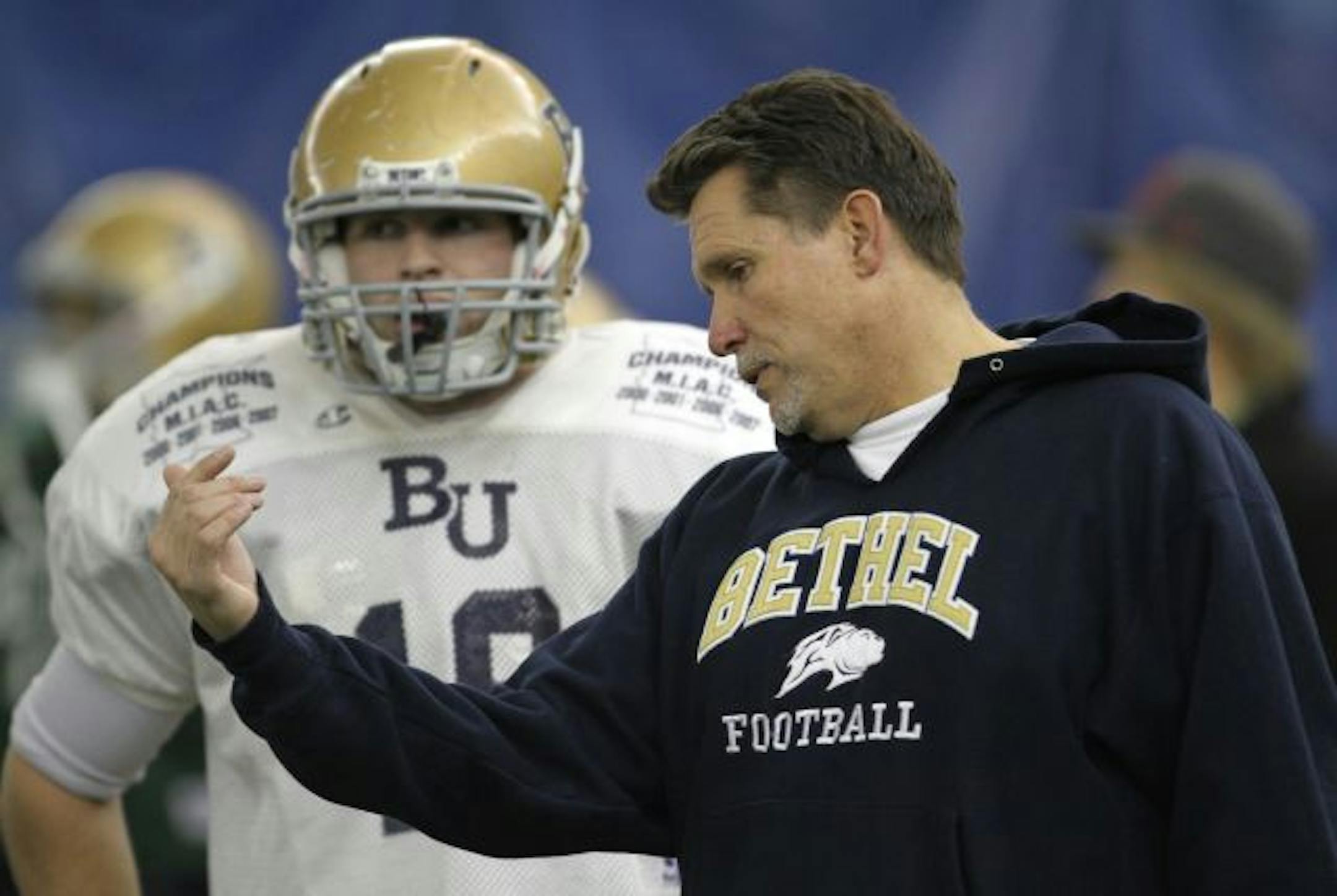 Bethel football coach Steve Johnson (right)
