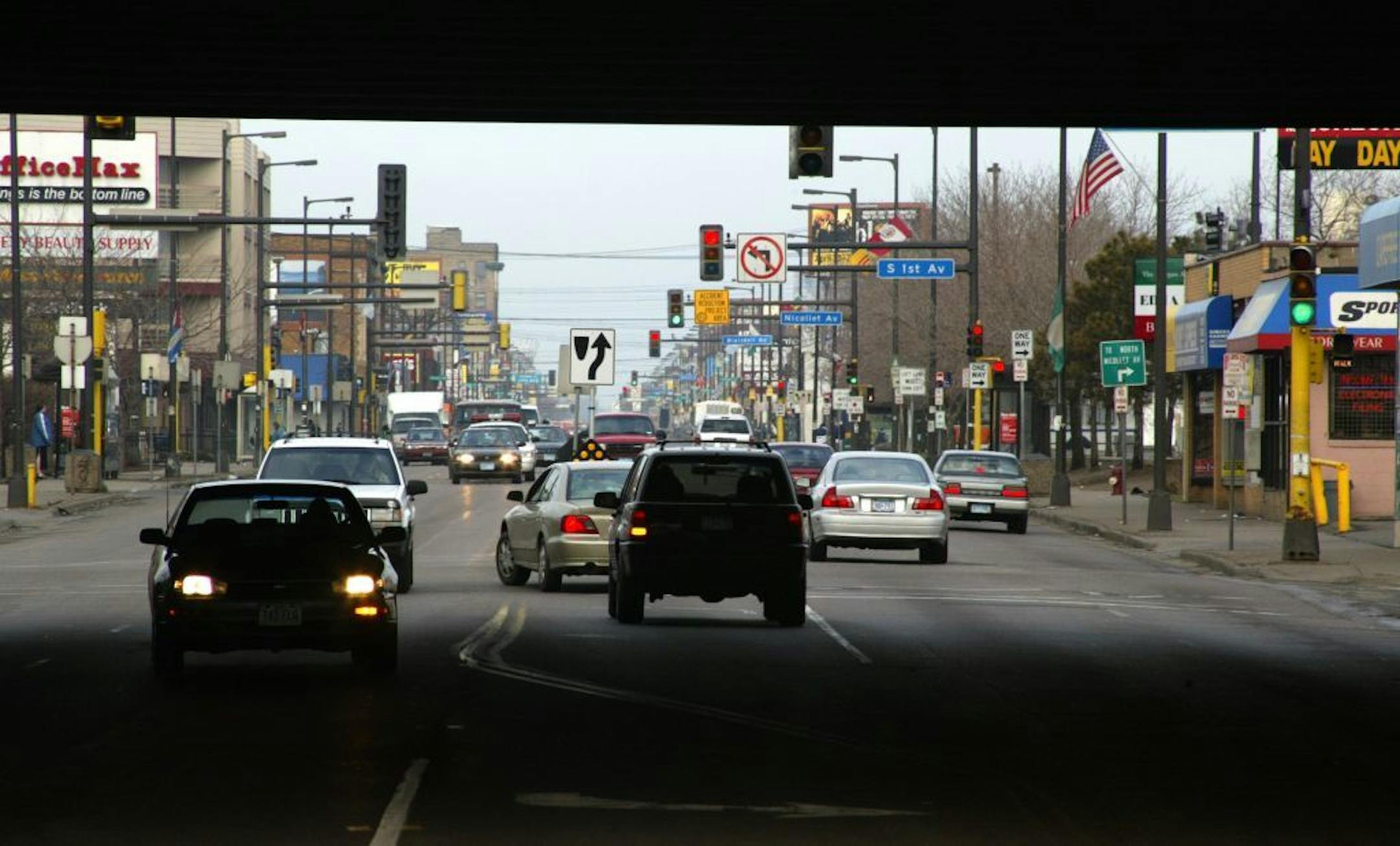 View of Lake street through the 35W overpass, looking west toward Nicollet Av.