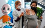 Pregnant women not only avoid severe illness by getting vaccinated, but they also pass high levels of antibodies on to their babies, researchers say. 