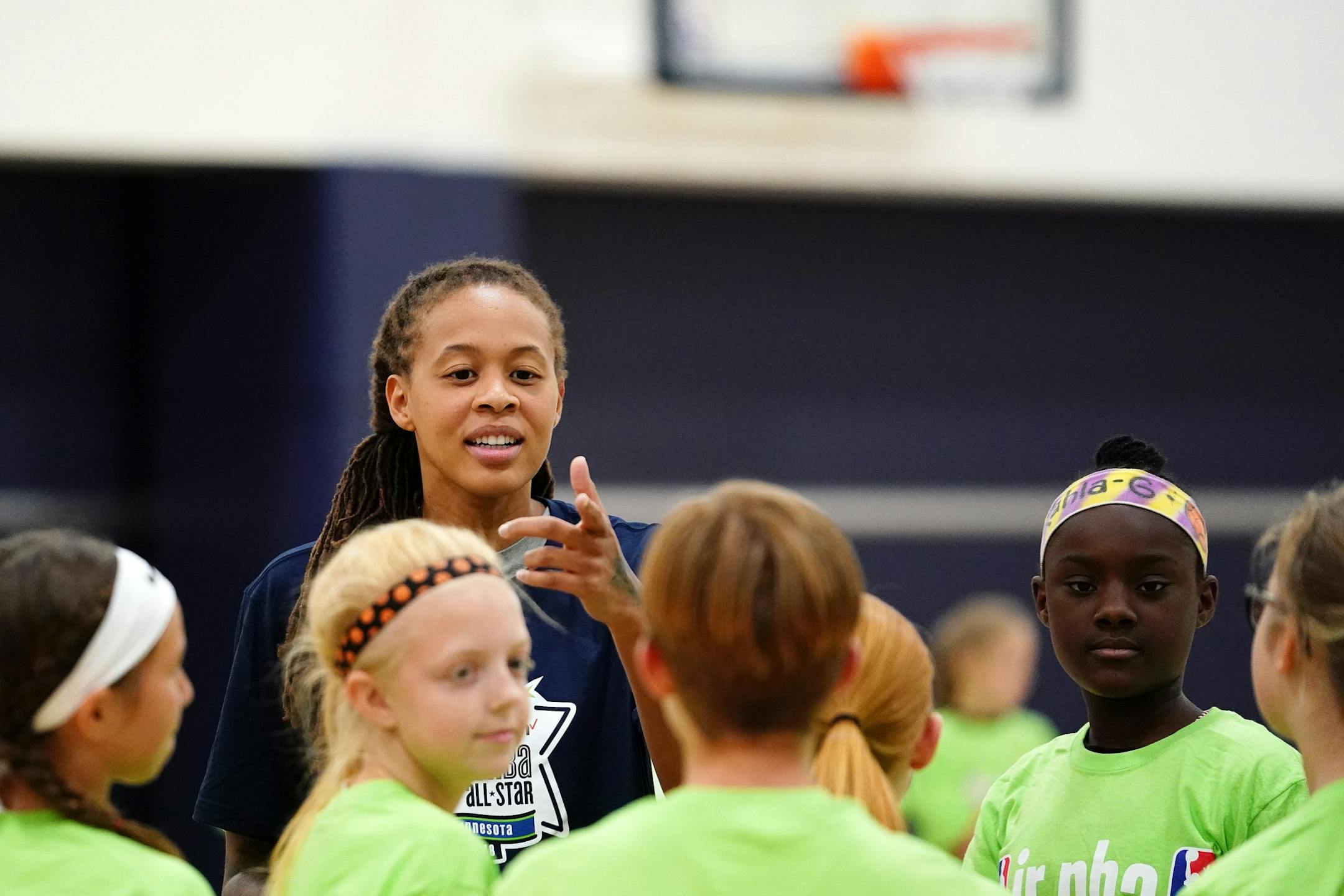 Minnesota Lynx guard Seimone Augustus (33) talked with her group during the clinic.