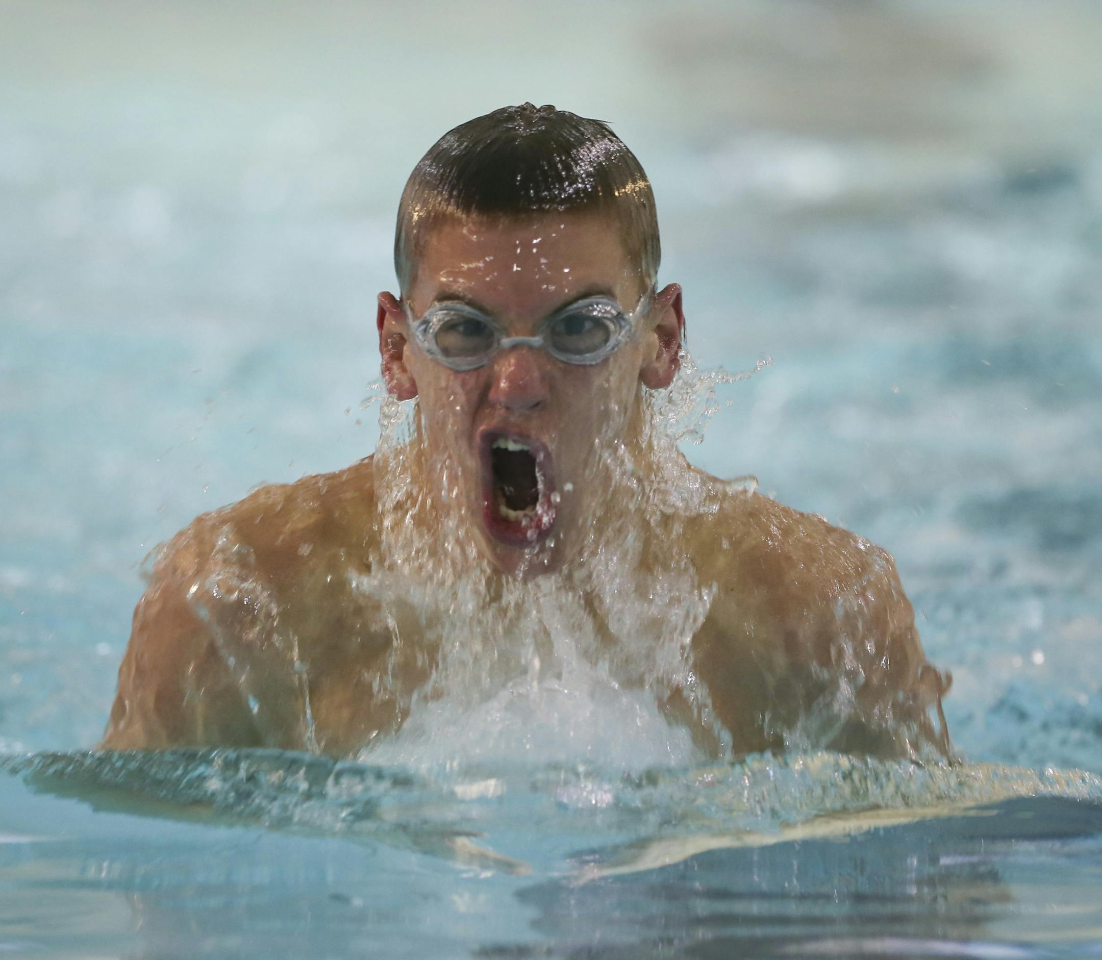 The East Ridge High School in Woodbury boy's swim team worked out Tuesday afternoon, January 22, 2013 at the pool at Woodbury Middle School. East Ridge sophomore James Tidd swimming the breast stroke at practice Tuesday afternoon. ] JEFF WHEELER ‚Ä¢ jeff.wheeler@startribune.com