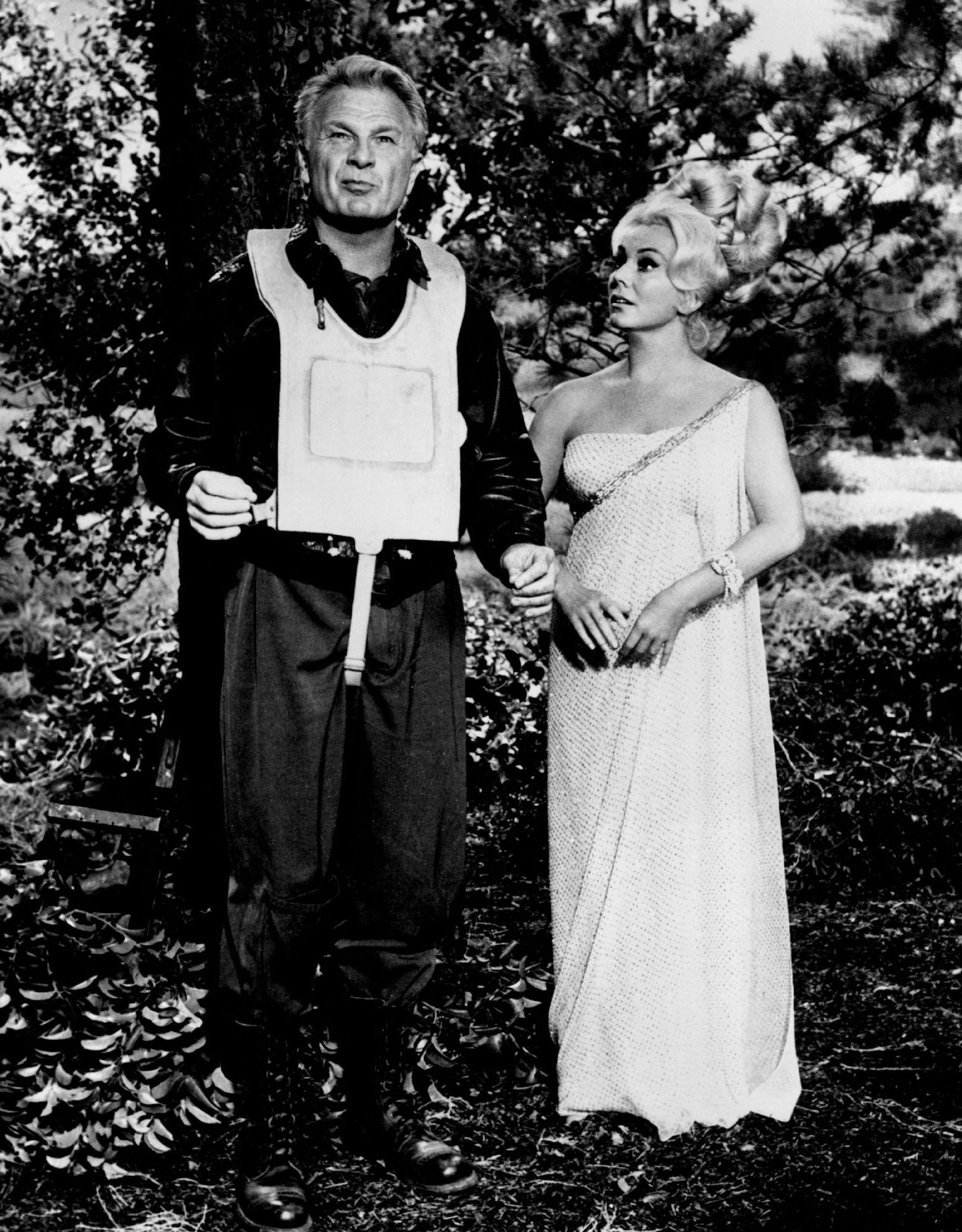 August 19, 1966 Subjects: Eddie Albert, Eva Gabor Program: "Green Acres" On Air: Wednesday, Sept. 14, 9:00-9:30 PM, EDT Season Premiere Flashback -- Eddie Albert is an American pilot and Eva Gabor works for the Hungarian under¬≠ground in a flashback sequence on "Green Acres," starting its second season Wednesday, Sept. 14 (9:00-9:30 PM, EDT) in color on the CBS Televi¬≠sion Network. CBS