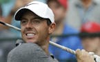Rory McIlroy of Northern Ireland, watches his tee shot on the 10th hole during the second round of the PGA Championship golf tournament at the Quail H