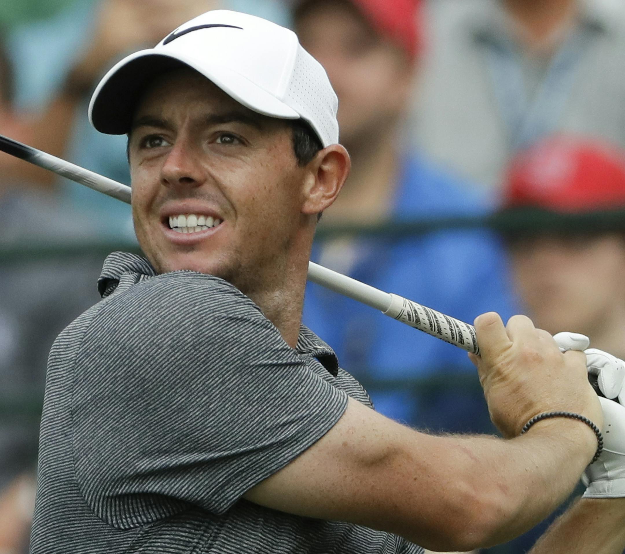 Rory McIlroy of Northern Ireland, watches his tee shot on the 10th hole during the second round of the PGA Championship golf tournament at the Quail Hollow Club Friday, Aug. 11, 2017, in Charlotte, N.C. (AP Photo/John Bazemore)