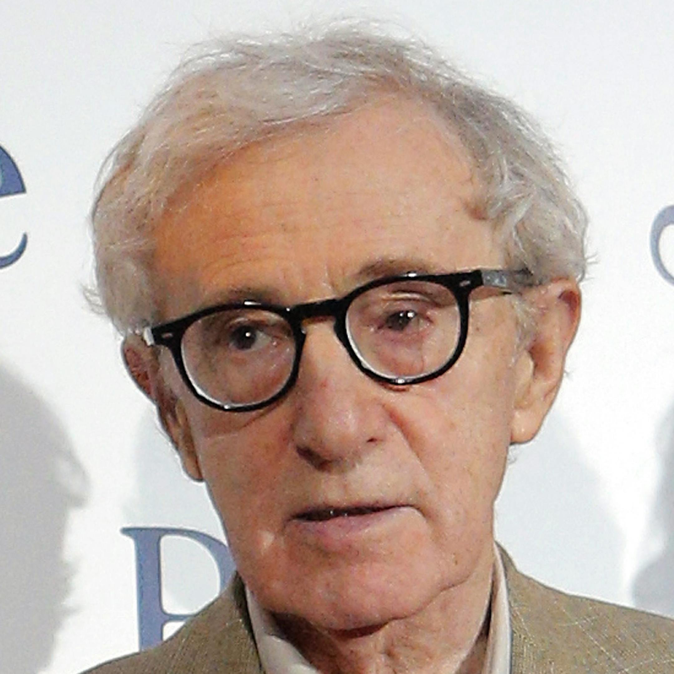 FILE - This Aug. 27, 2013 file photo shows director and actor Woody Allen at the French premiere of "Blue Jasmine," in Paris. Allen will receive the Cecil B. DeMille Award at Sundayís Golden Globes ceremony. The writer-director famously avoids awards shows, though, and skipped those for his previous 12 Golden Globe nominations. (AP Photo/Christophe Ena, File)