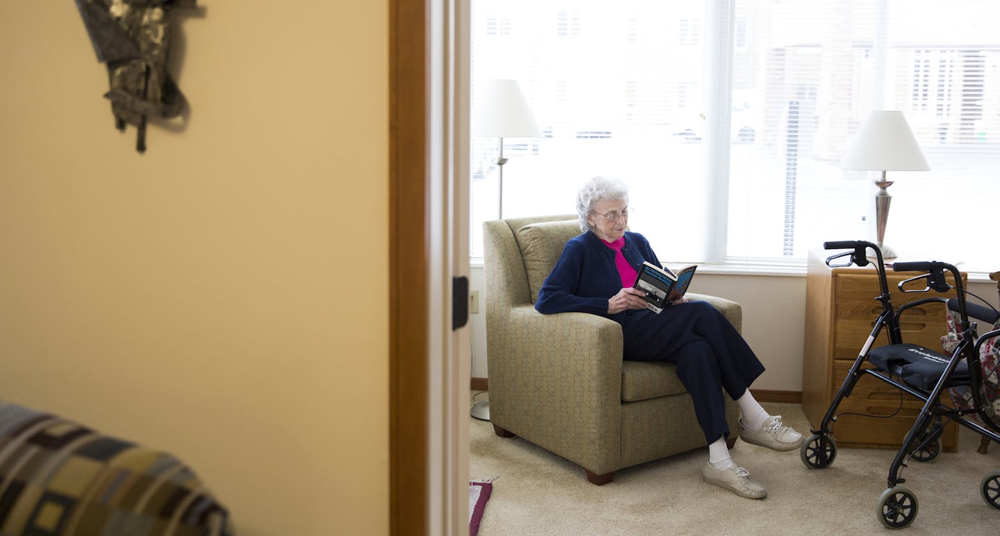 Sister Mary Madonna Ashton reads after mass at her home in Carondelet Village in St. Paul. ] (Leila Navidi/Star Tribune) leila.navidi@startribune.com BACKGROUND INFORMATION: Tuesday, March 15, 2016. Sister Mary Madonna Ashton, 92, of the Sisters of St. Joseph is being honored as a 2016 National Women&#xed;s History Month Honoree. Ashton served as president and CEO of St. Mary&#xed;s Hospital in Minneapolis, State Commissioner of Health under Governor Rudy Perpich, and founded St. Mary&#xed;s Hea