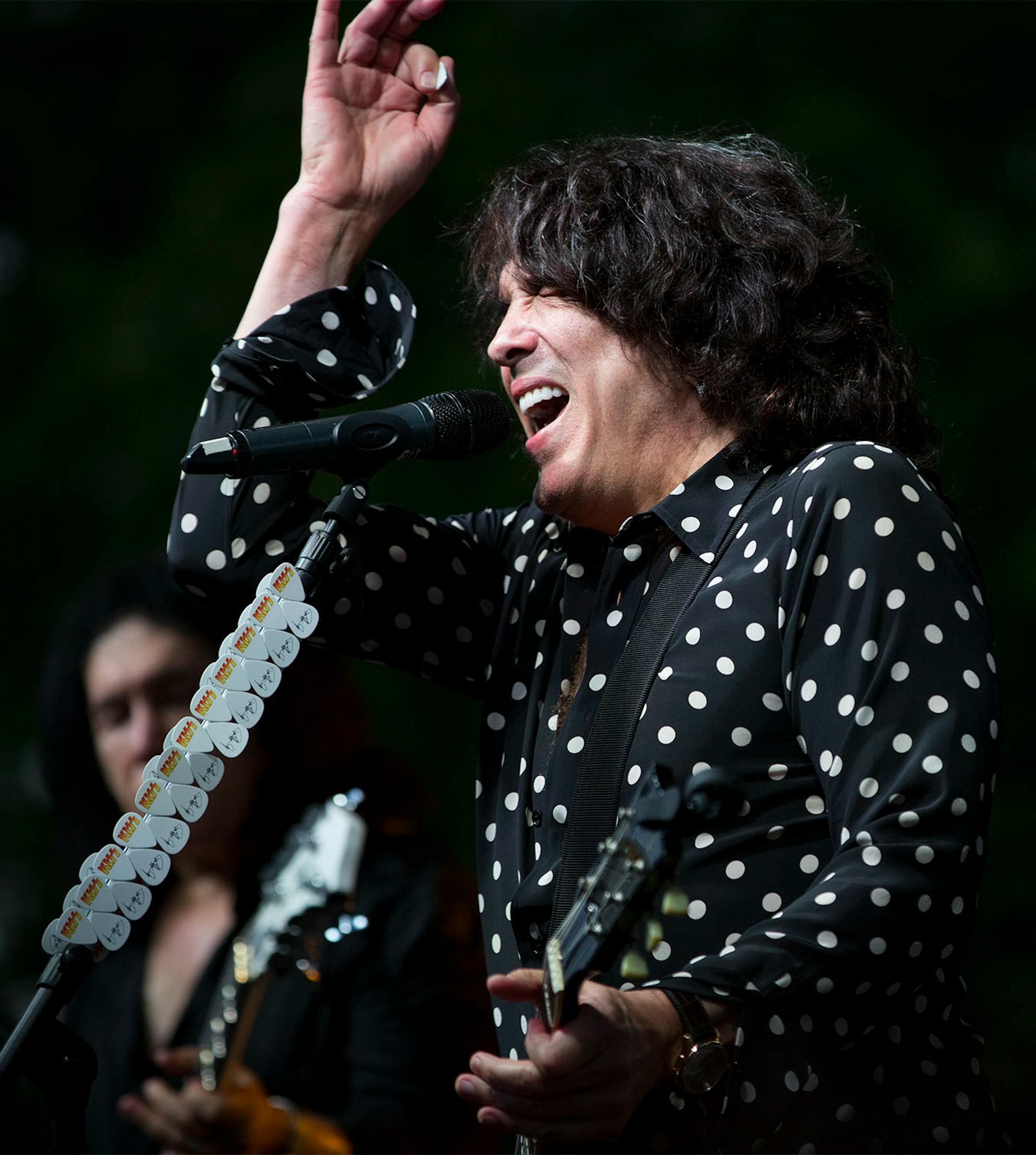 Paul Stanley of Kiss performed with the band on stage during a charity concert at philanthropist Martha "Muffy" MacMillan's home on Tuesday, August 2, 2016, in Long Lake, Minn.