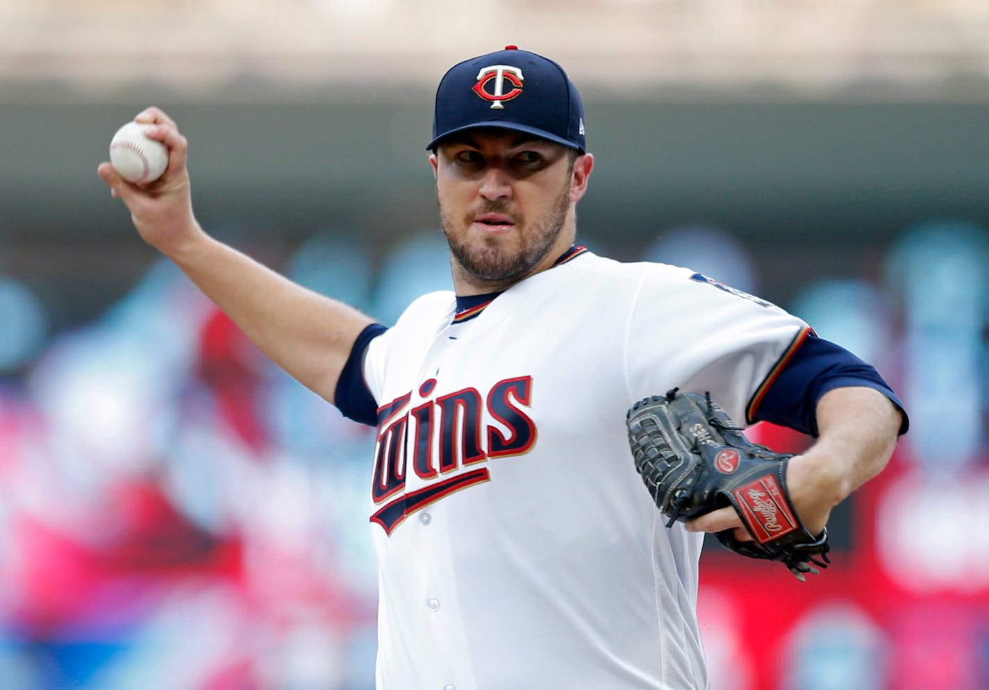 The Twins placed righthander Phil Hughes on the 10-day disabled list because of shoulder discomfort.