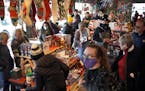 Last-minute Christmas shoppers packed the Patina store Wednesday in Golden Valley. 