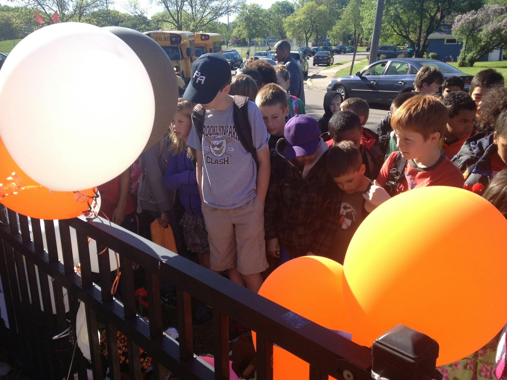 Students viewed a memorial Friday morning at Peter Hobart Elementary school in St. Louis Park. The memorial was for two students killed in a mudslide during a class field trip.