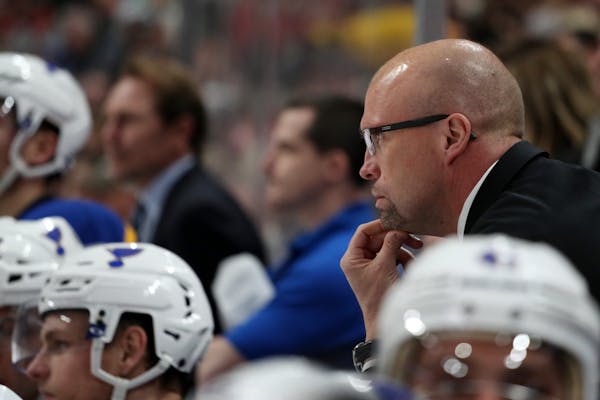St. Louis Blues head coach Mike Yeo watched from the bench in the second period.