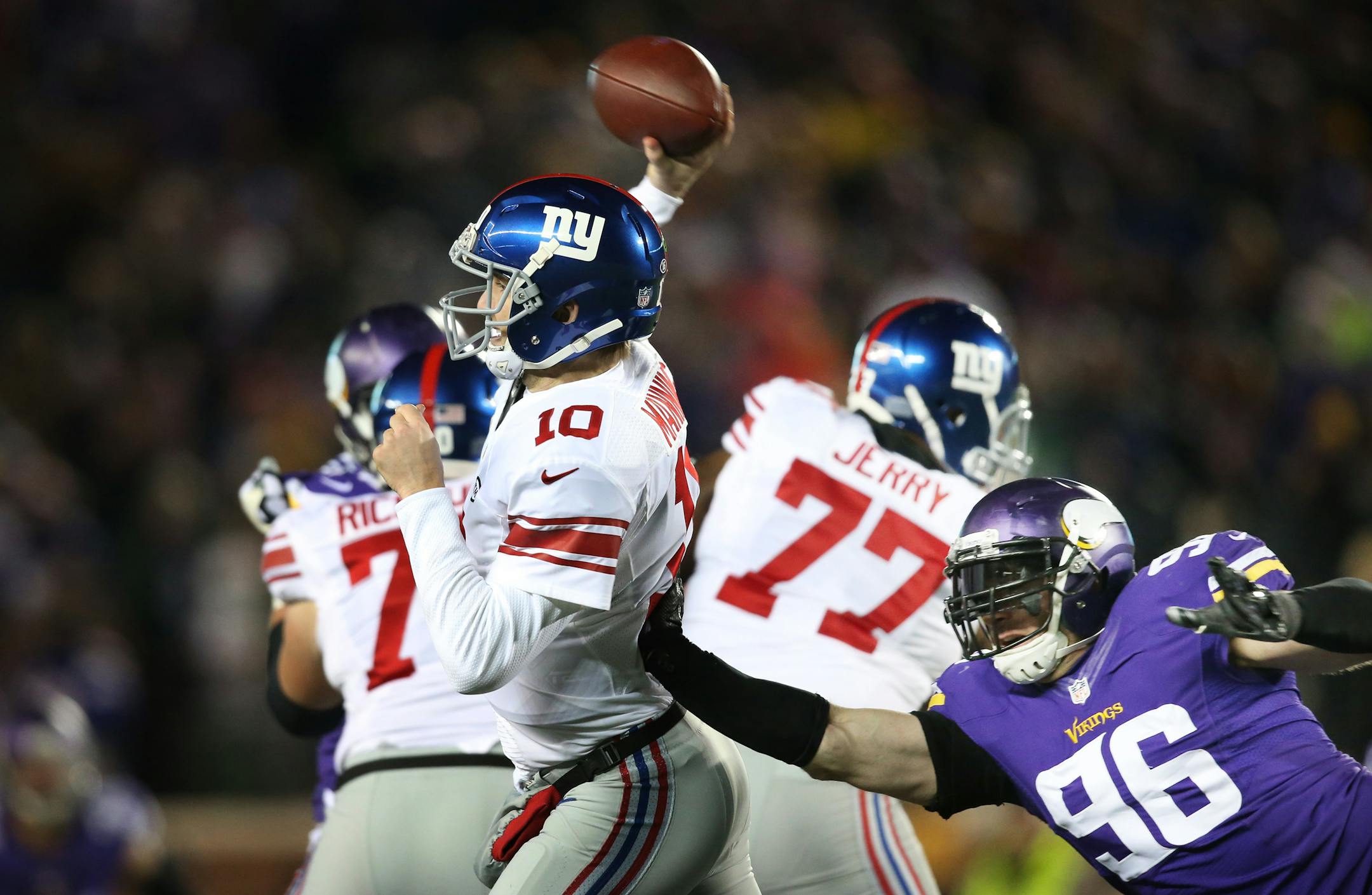 Giants quarterback Eli Manning was pressured into throwing an incomplete pass by Vikings defensive end Brian Robison in the third quarter Sunday. The Vikings beat the Giants 49-17 at TCF Bank Stadium.