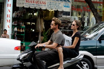 Brad Pitt and Angelina Jolie spent Thanksgiving, Thursday, Nov. 23, 2006 cruising on a motorbike while touring Ho Chi Minh City, Vietnam. Prior to arr