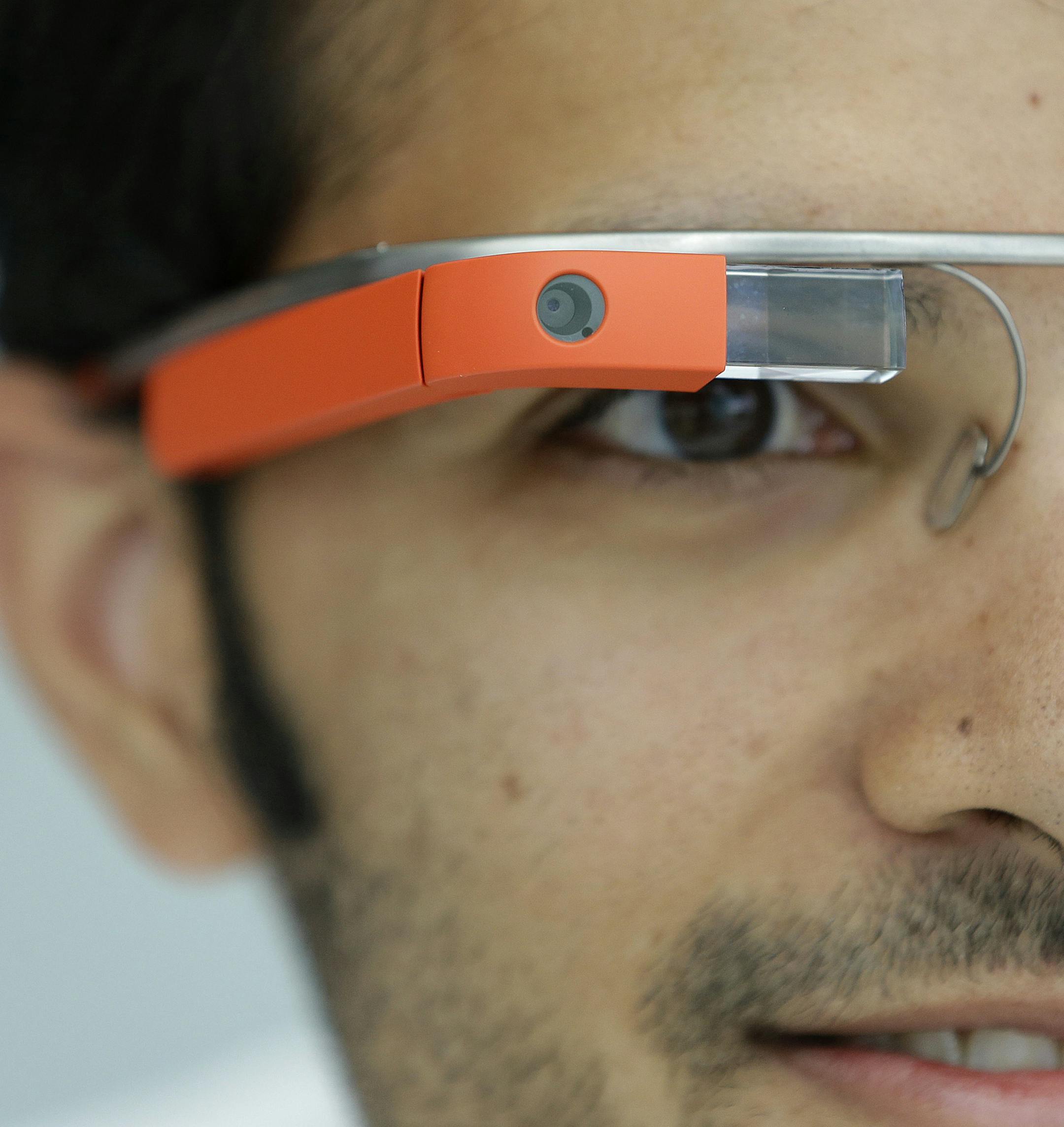 FILE - This May 15, 2013 file shows Google Glasses displayed in San Francisco. Google has a challenge for U.S. nonprofits. On Tuesday, the tech giant is asking nonprofit groups to propose ideas for how to use the Web-connected eyewear Google Glass in their work. Five charities that propose the best ideas by May 20 will get a free pair of the glasses, a trip to Google for training and a $25,000 grant to help make their project a reality. (AP Photo/Jeff Chiu, File)