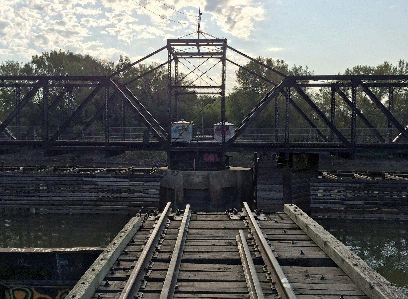 The city of Savage wants a new Minnesota River crossing on the site of the Dan Patch swing bridge, while the city of Bloomington is strongly opposed. The bridge carried cars until the mid-1980s but now carries only an occasional train.