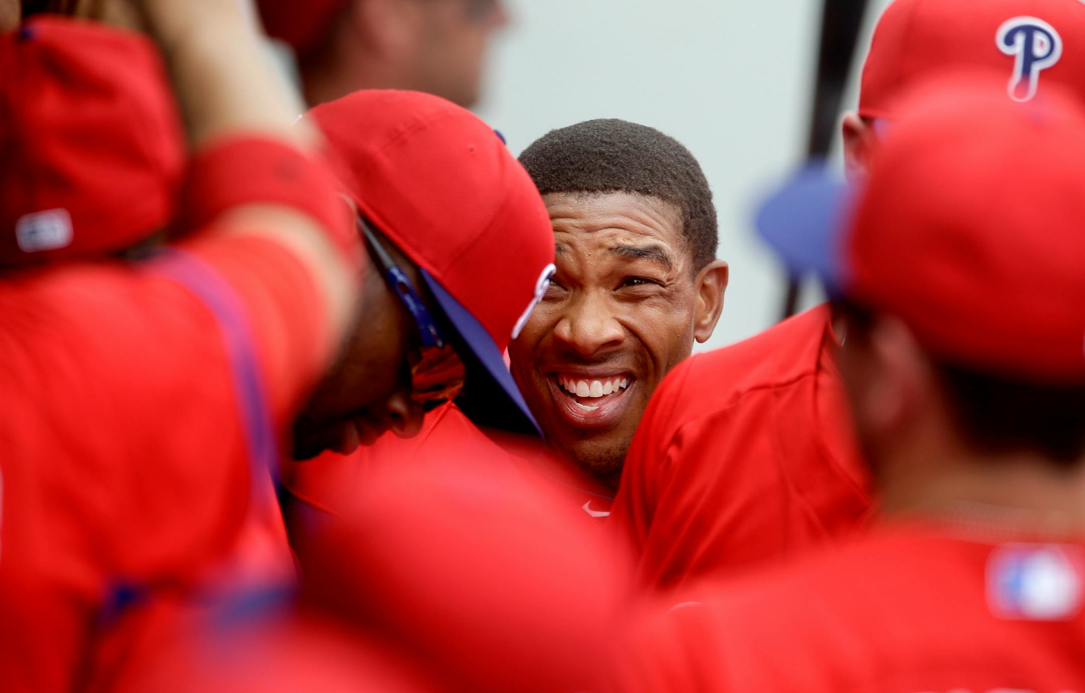 Ben Revere, the once and future Twins center fielder, was swarmed by his new teammates in Philadelphia after scoring in the first inning Wednesday.