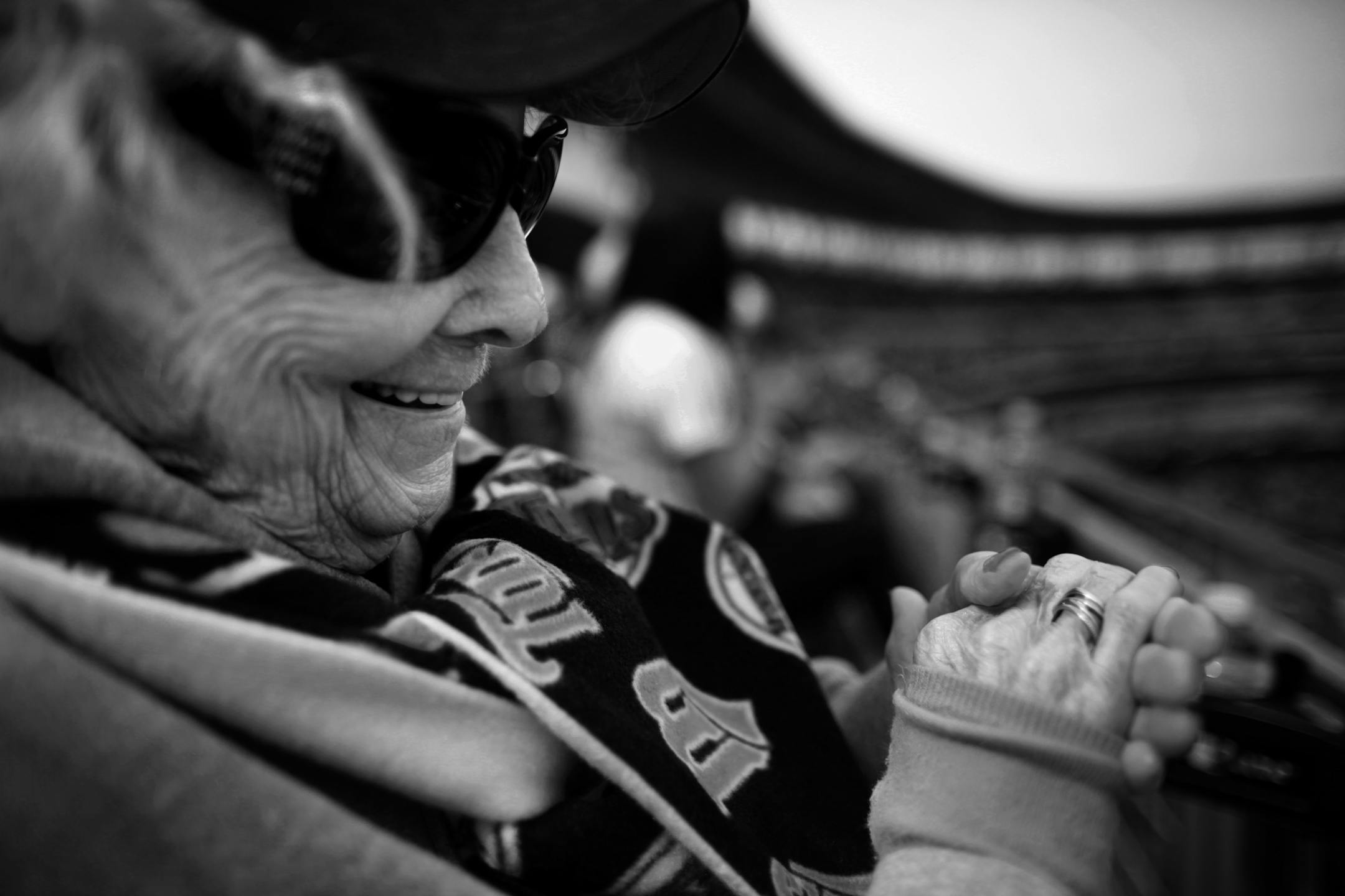 �I have no clap left!� Ollie said, bundled up in her Twins fleece scarf, sweatshirt and hat while trying to make some noise as her favorite team took the field. Her once powerful arms that slugged softballs while playing for Powers Mercantile Co. in the 1930�s have lost some of their punch, but her love for the game has not waned. Her love affair started in 1915 when her father brought her to Nicollete Park to watch the Minneapolis Millers, she was smitten with one of the players, �Unfortunately