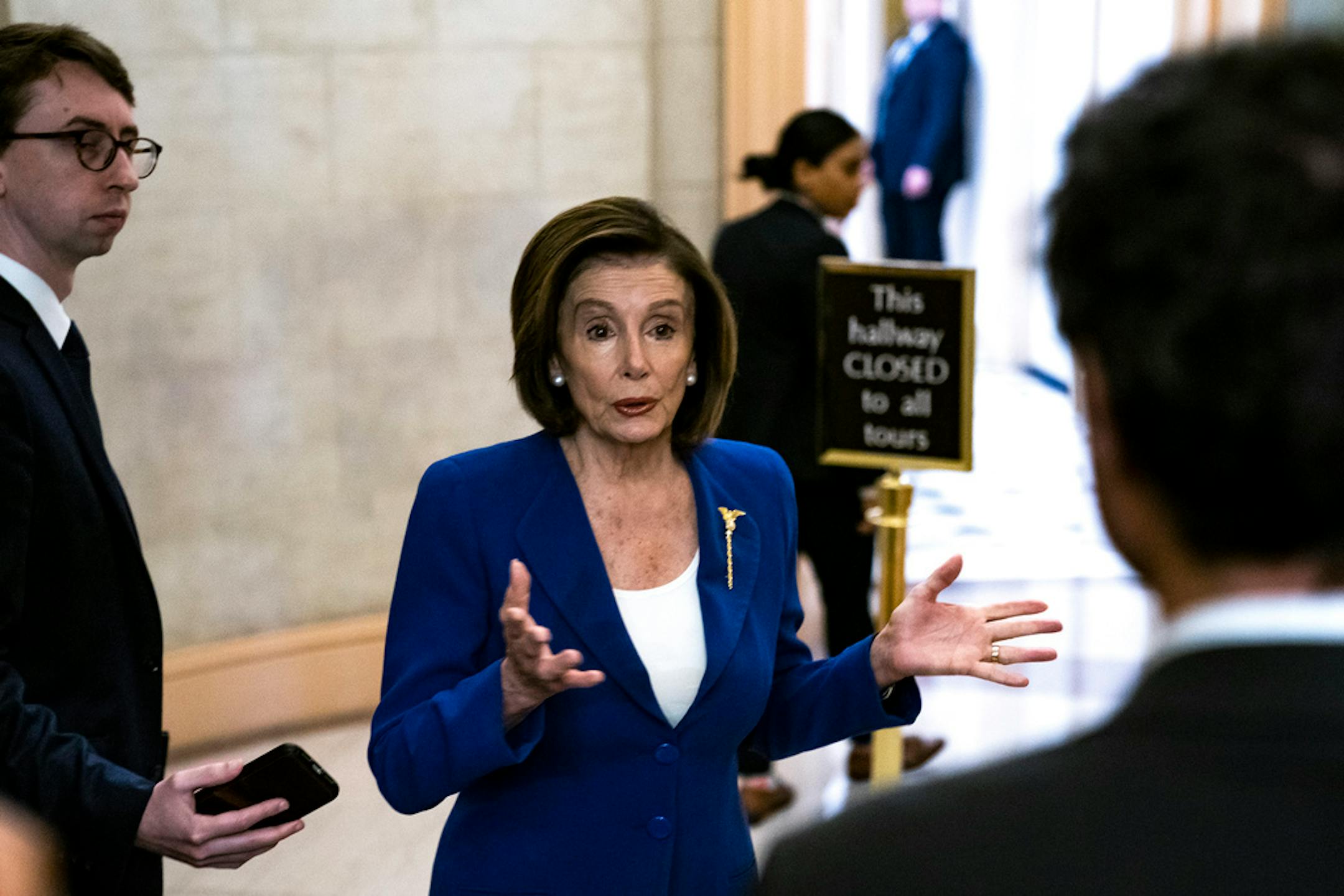 House Speaker Rep. Nancy Pelosi (D-Calif.) speaks with reporters at the Capitol in Washington, Friday morning, March 27, 2020.