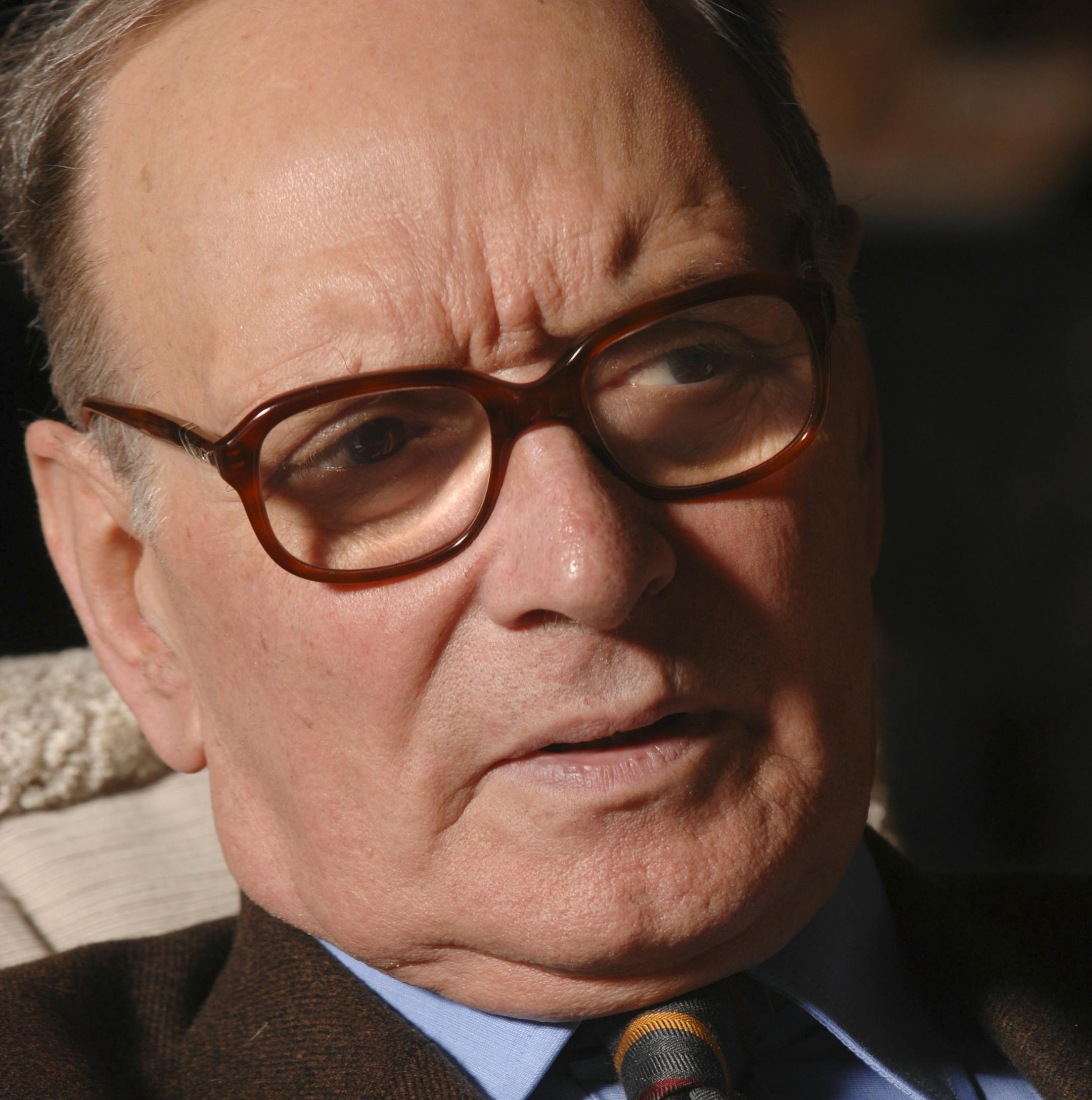 FILE -- Ennio Morricone at his home in Rome, Dec. 7, 2006. Morricone, the Italian composer whose atmospheric scores for spaghetti westerns and some 500 films by a Who's Who of international directors made him one of the world's most versatile and influential creators of music for the modern cinema, died on July 6, 2020, in Rome. He was 91. (Chris Warde-Jones/The New York Times)