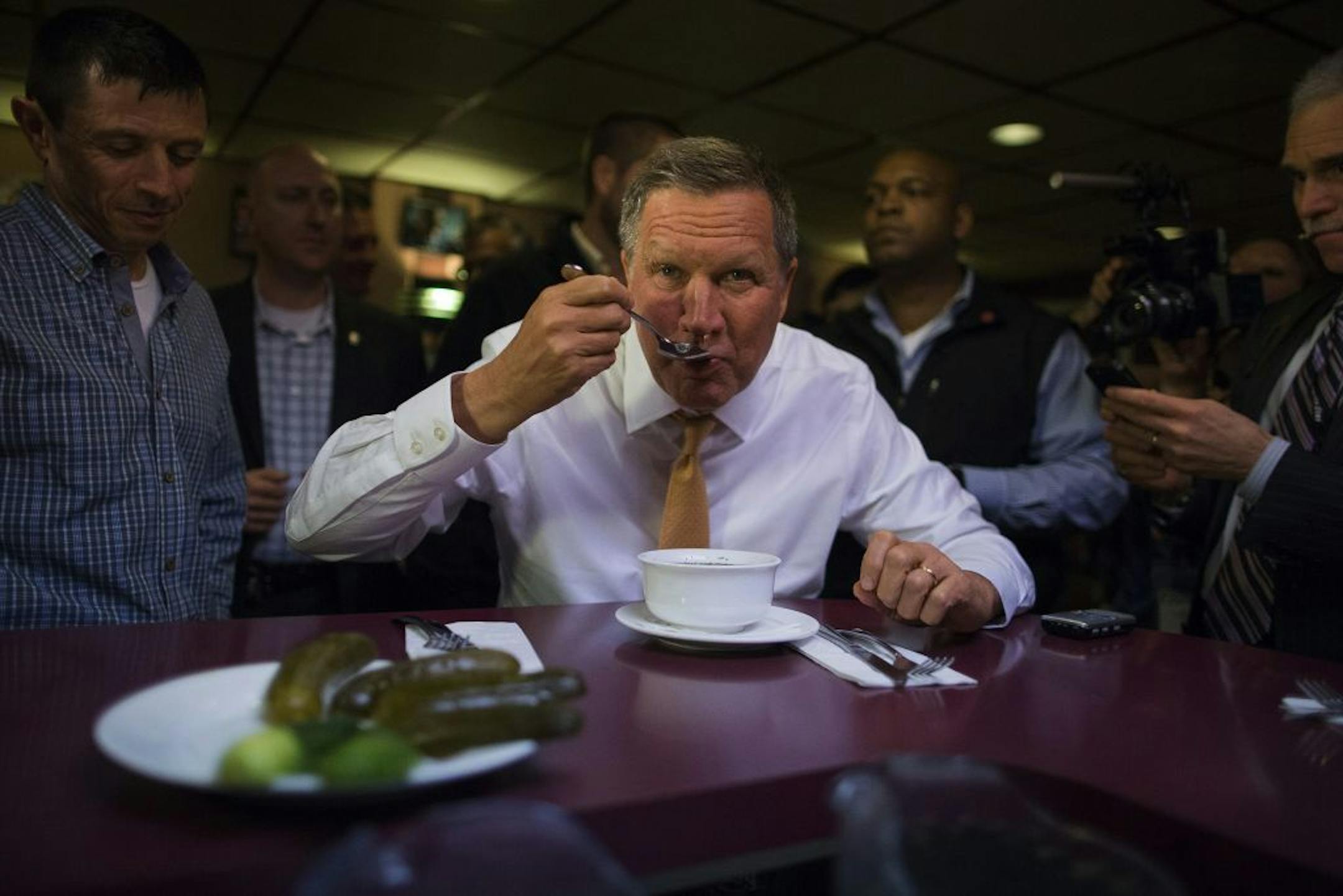 Republican presidential candidate, Ohio Gov. John Kasich eats lunch at PJ Bernstein's Deli Restaurant during a campaign stop in New York, Saturday, April 16, 2016.