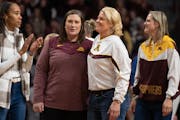 Former University of Minnesota Final Four women's basketball coach Pam Borton,right hugged former player Lindsay Whalen during a celebration of the 20