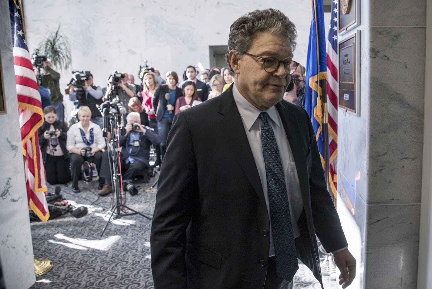 Sen. Al Franken, D-Minn., returns to his office after speaking to the media on Capitol Hill in Washington, Monday, Nov. 27, 2017. (AP Photo/J. Scott Applewhite)