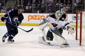 Nic Petan, playing for Winnipeg, was stopped by Wild goalie Devan Dubnyk during a game in 2017. 