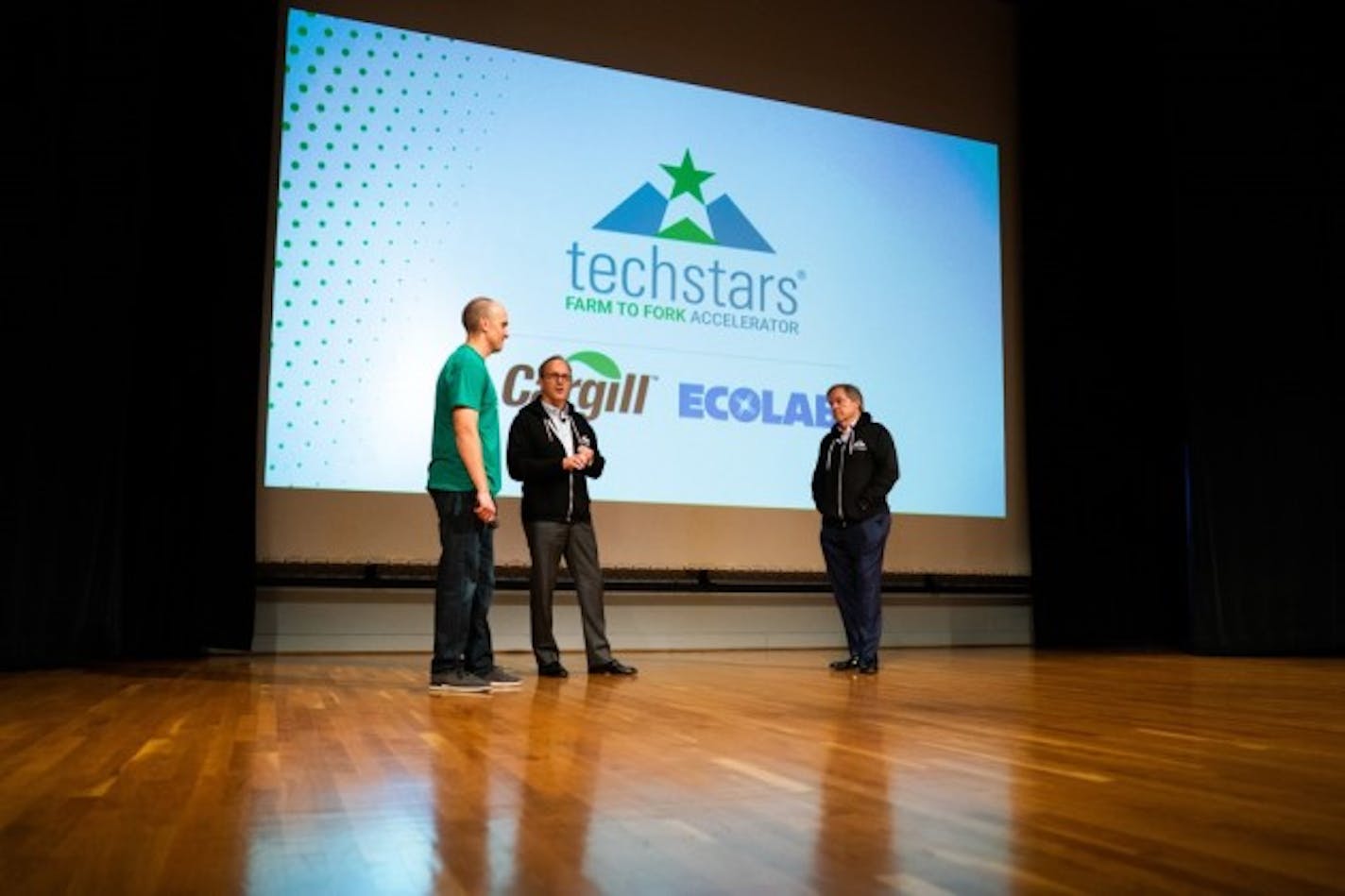 Ecolab CEO Doug Baker (middle) and Cargill CEO David MacLennan (right) at Techstars Farm to Fork 2018 Demo Day. (Photo: Mark Vancleave/Star Tribune)