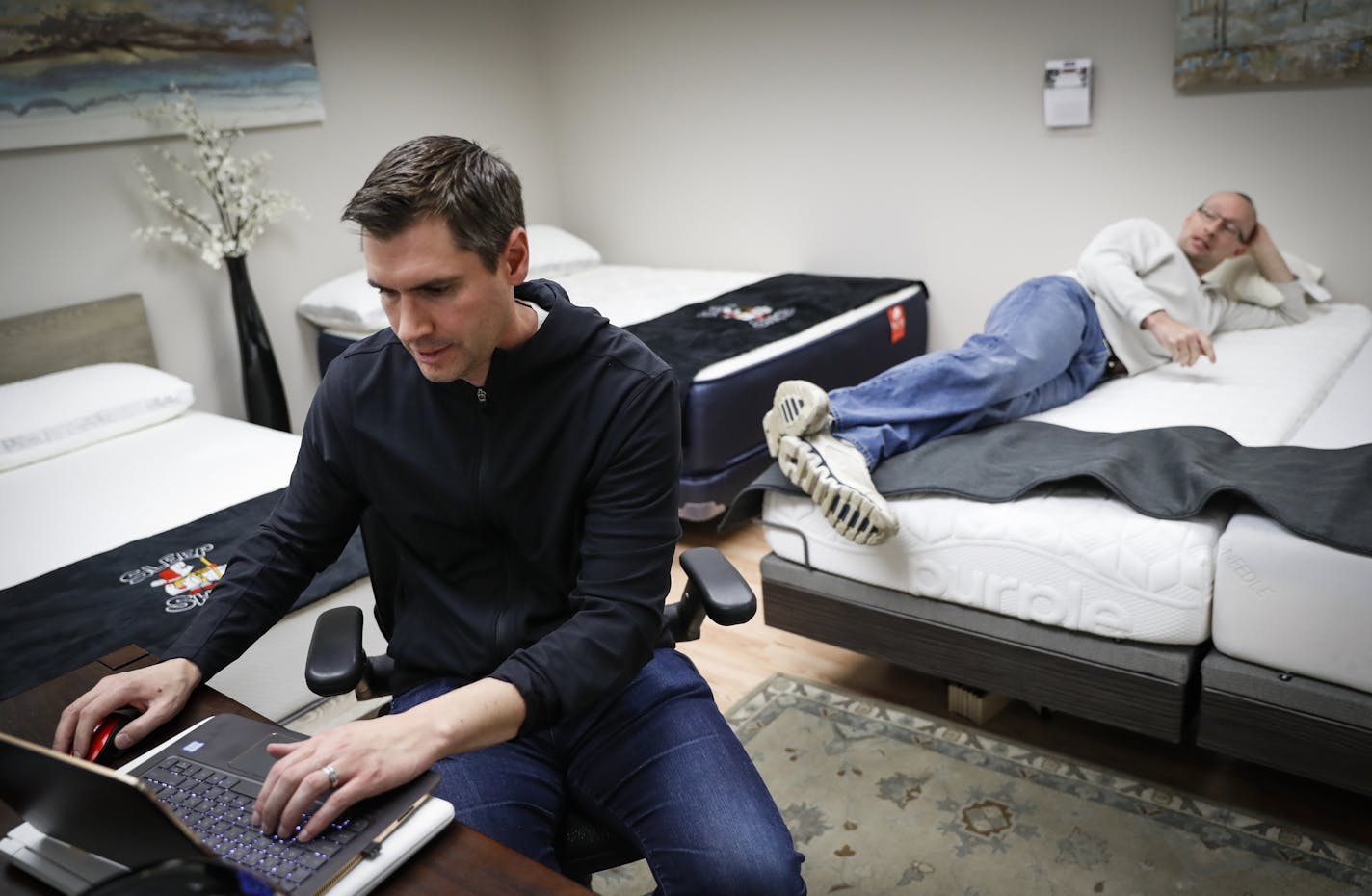 Ben Trapskin (left) answered questions for Kevin Bartenberger who had driven up from Lacrosse while on a family vacation from Ohio to visit the Mall of America and the Sleep Sherpa in Edina, Minn. to try out mattresses before ordering one online, on March 24, 2017. ] RENEE JONES SCHNEIDER &#x2022; renee.jones@startribune.com