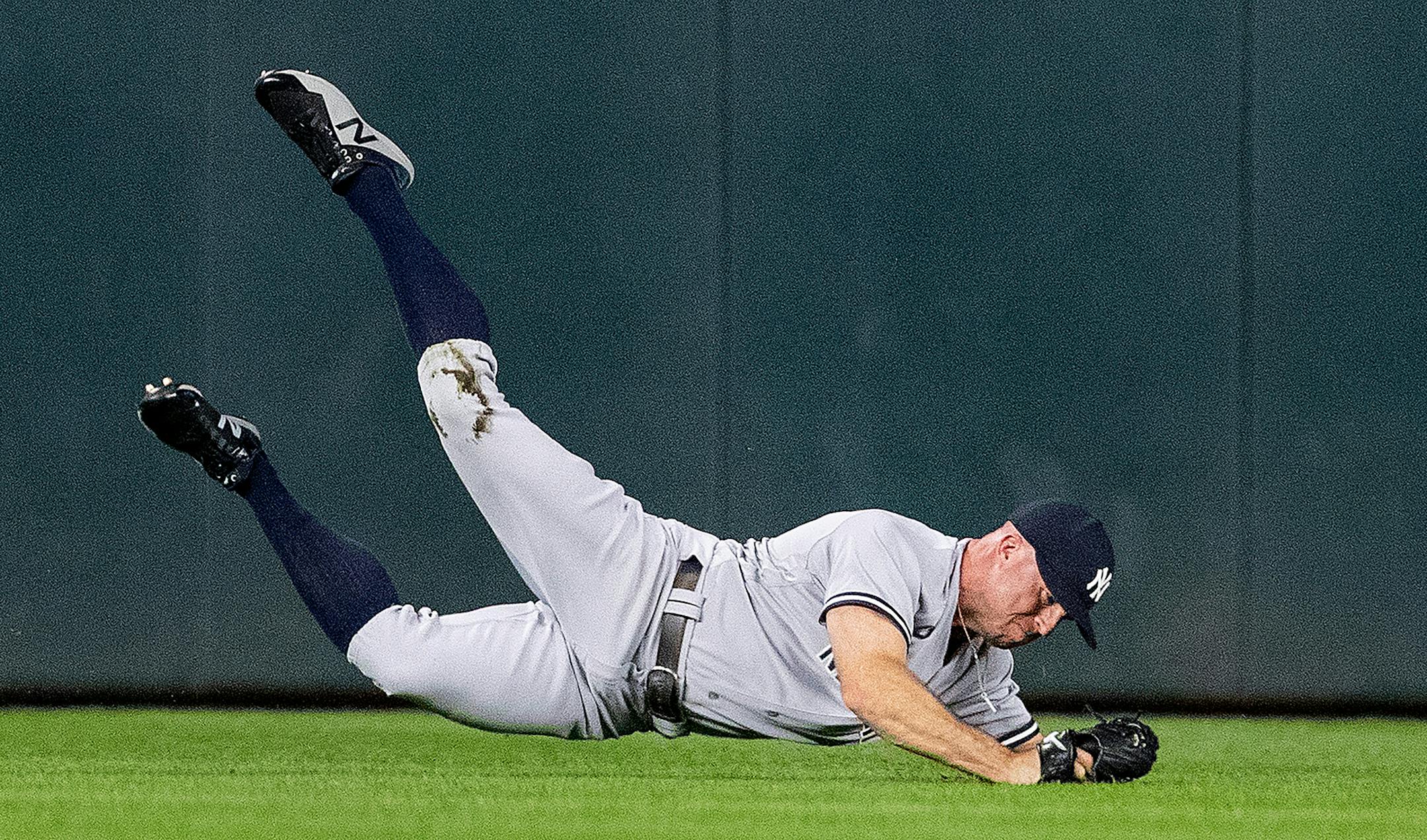 Yankees left fielder Brett Gardner caught a fly ball hit by Gregorio Petit in the second inning.