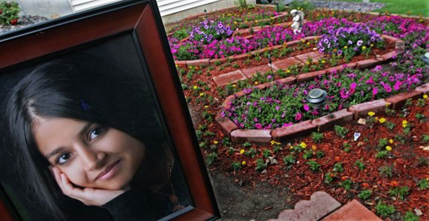 A memorial garden for Shreya Dixit is shaped in the form of a "s" at her parents, Vijay and Rekha Dixit's Eden Prairie home. Shreya was killed in an auto accident.