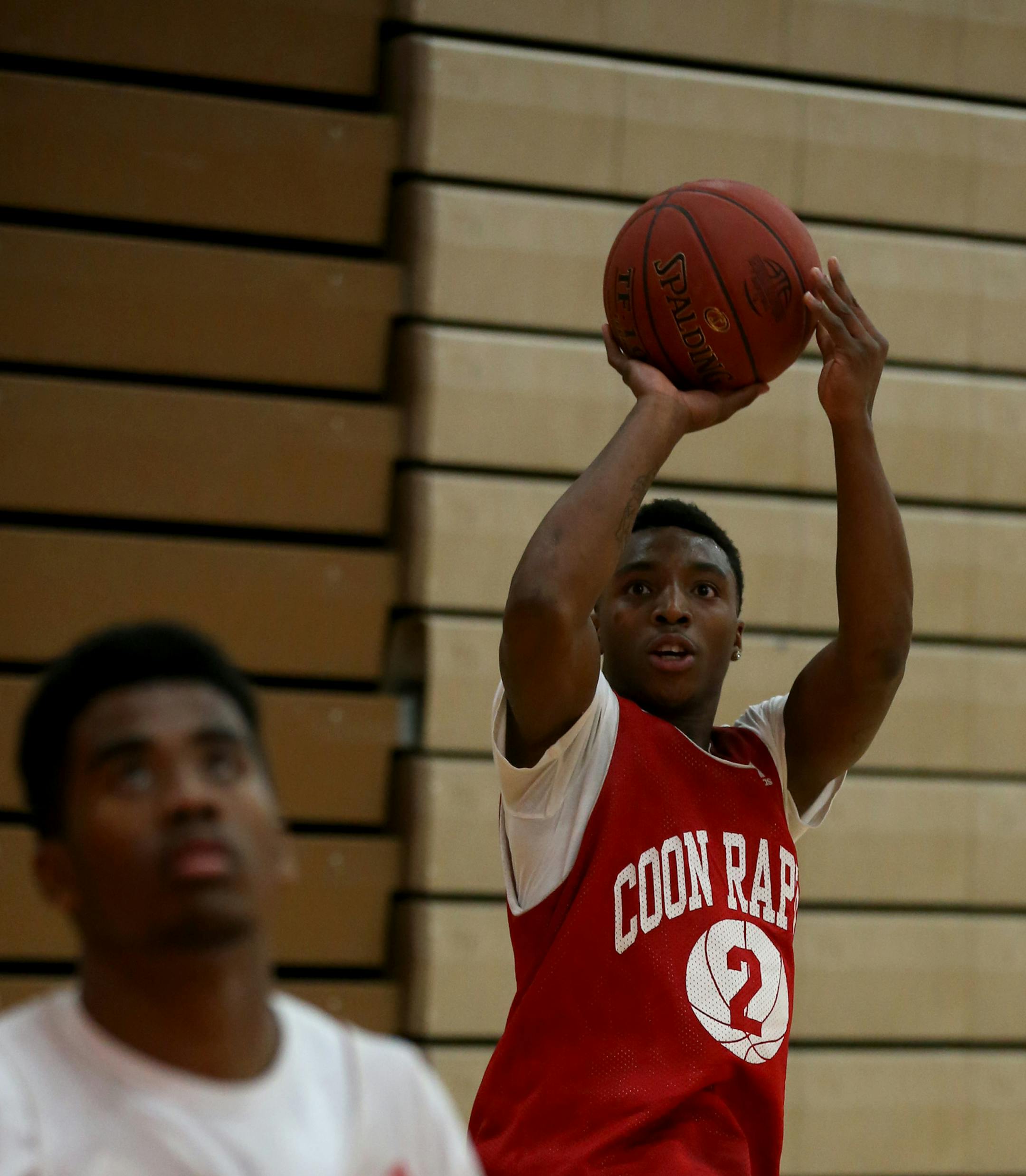 Coon Rapids basketball player Chris Buckley took a jump shot as they ran drills. ] (KYNDELL HARKNESS/STAR TRIBUNE) kyndell.harkness@startribune.com During practice in Coon Rapids , Min., Thursday, December 4, 2014.
