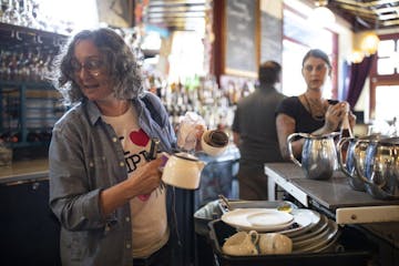 Kim Bartmann looked for a spot to set her teapot after a morning meeting at Barbette.