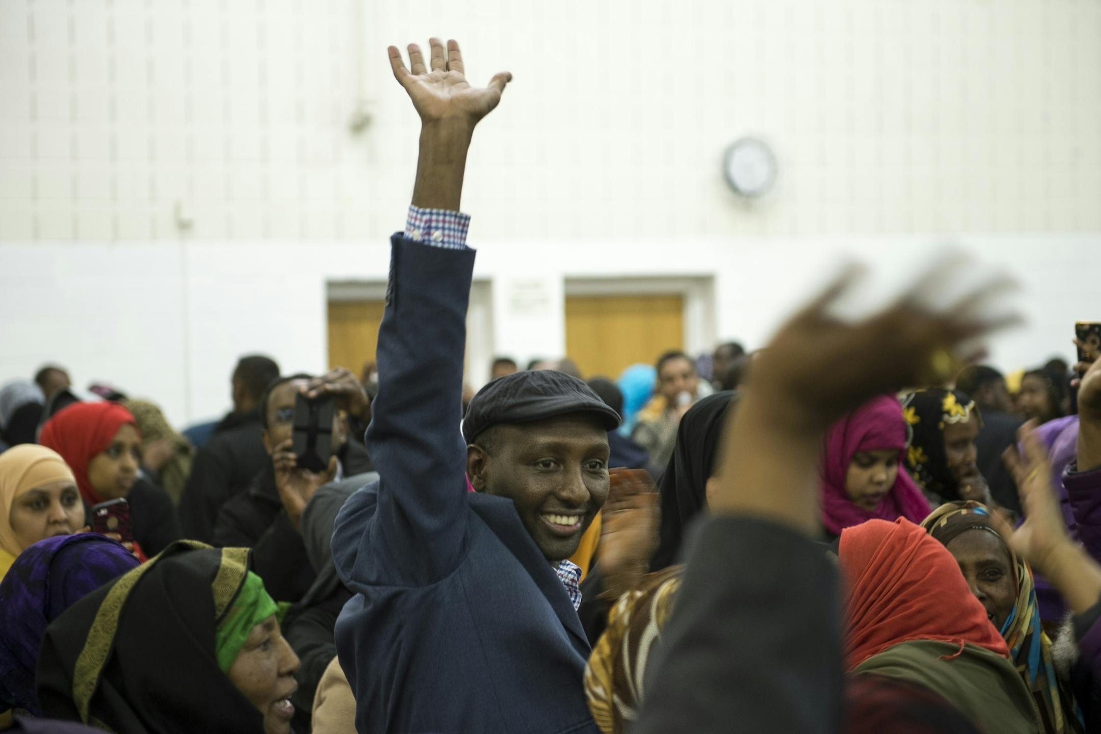 District 60B State Representative Candidate Mahmoud Noor celebrated his securing of the most delegates at the DFL caucus site at the Brian Coyle Center Wednesday night.
