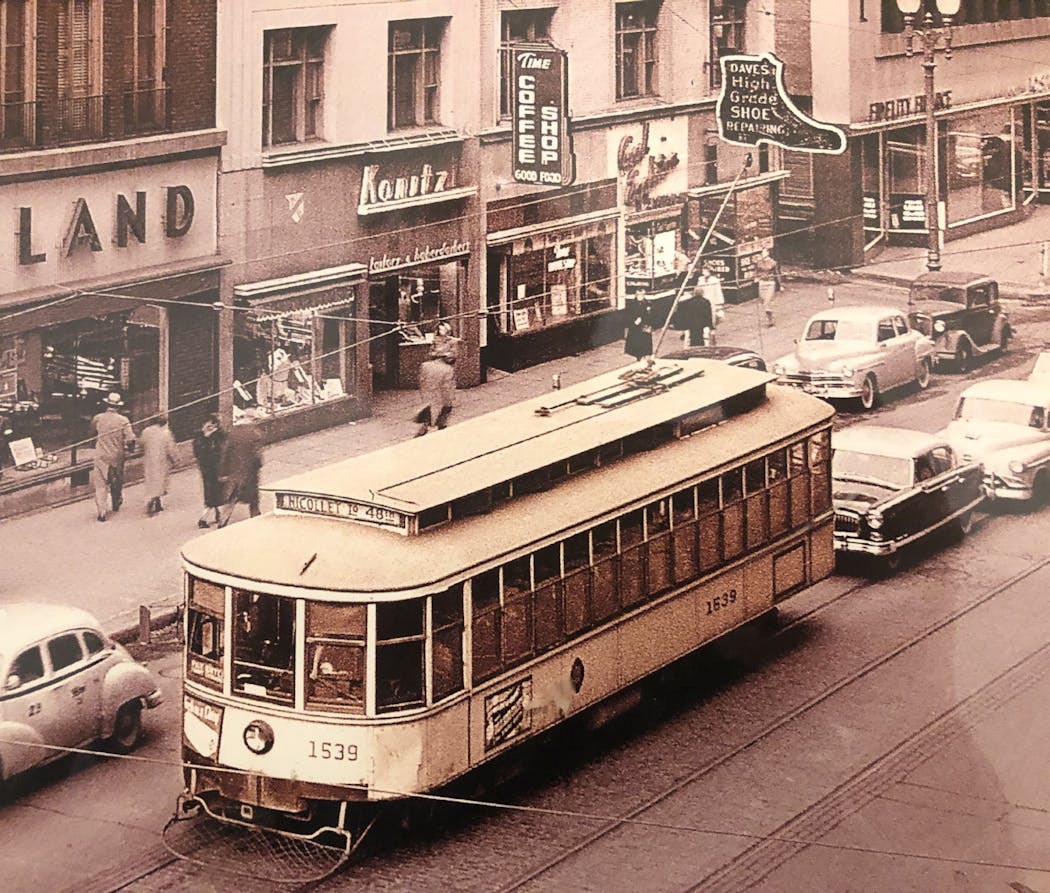 A 1950s-era streetcar rumbled through downtown.