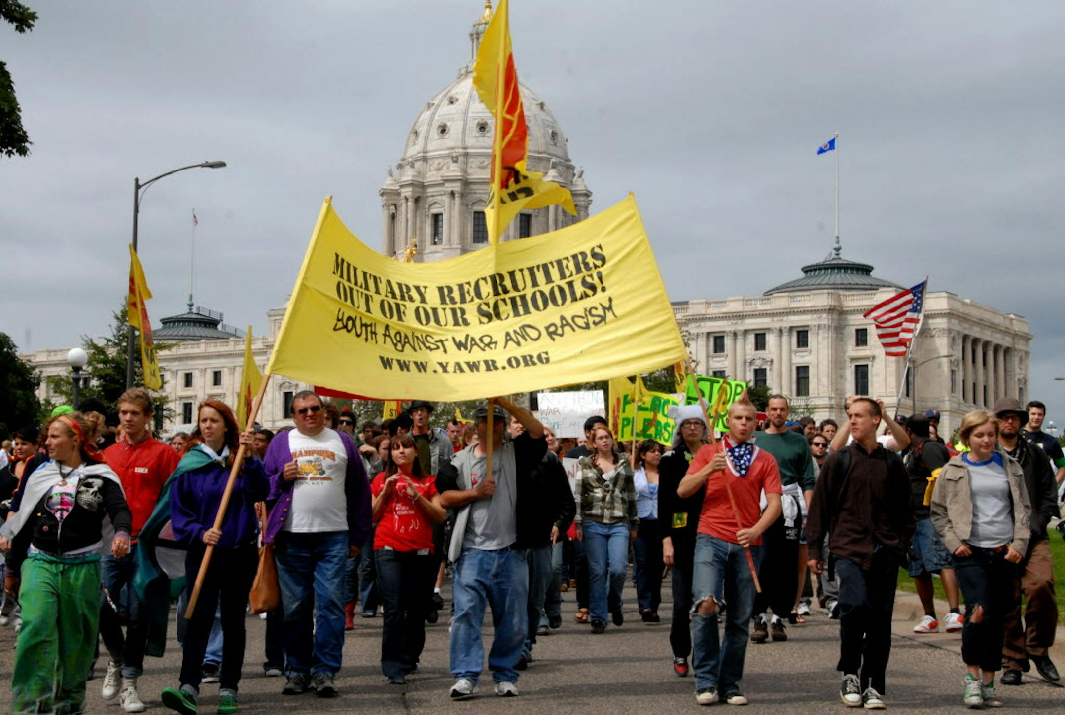 Several hundred high school students and others marched from the State Capitol through downtown St. Paul to Harriet Island to protest war and racism and war criminals.