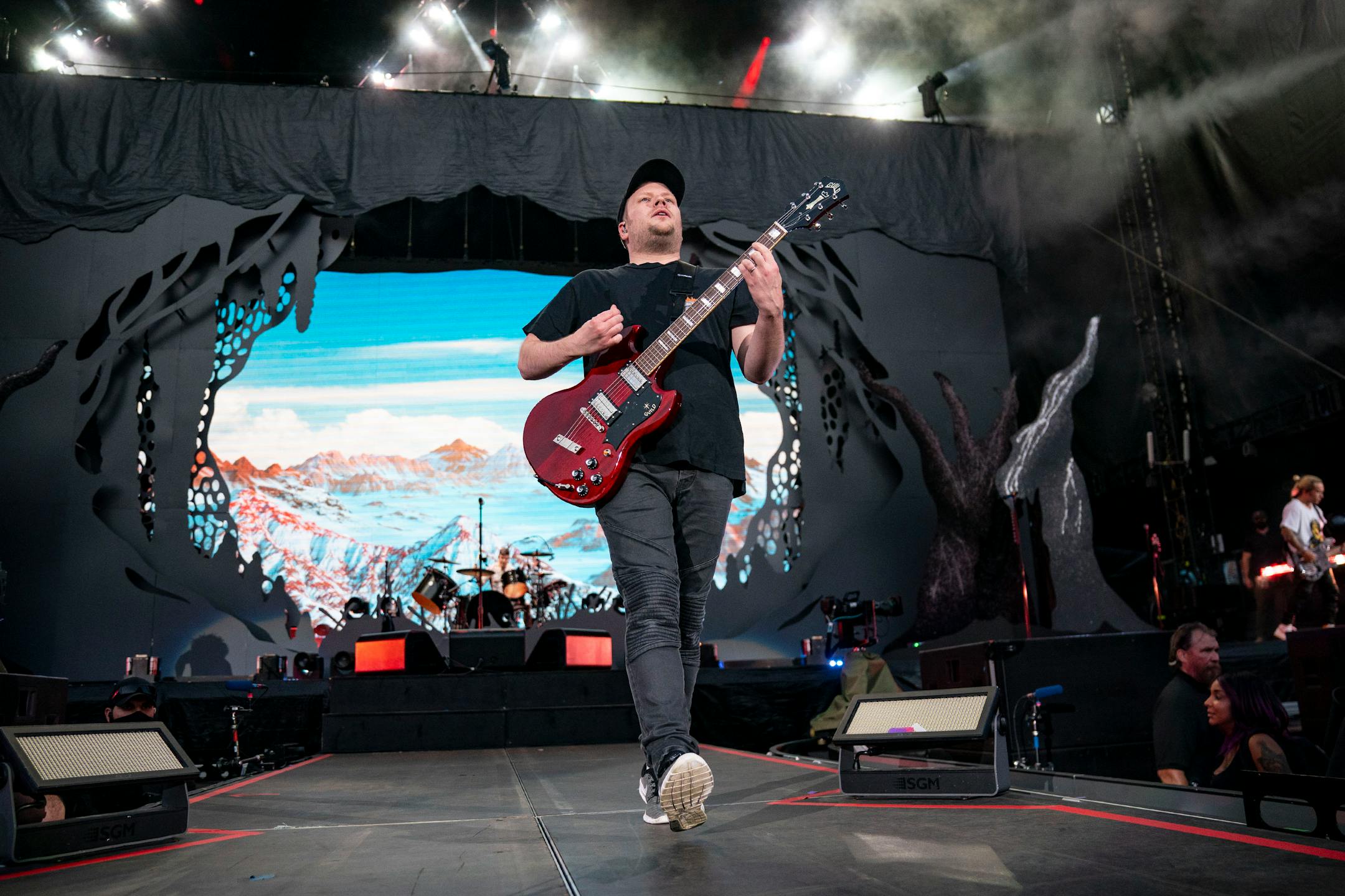 Patrick Stump, lead singer of Fall Out Boy, walked down the stage leading to the edge of the pit at the Hella Mega Tour at Target Field in Minneapolis on Monday.
