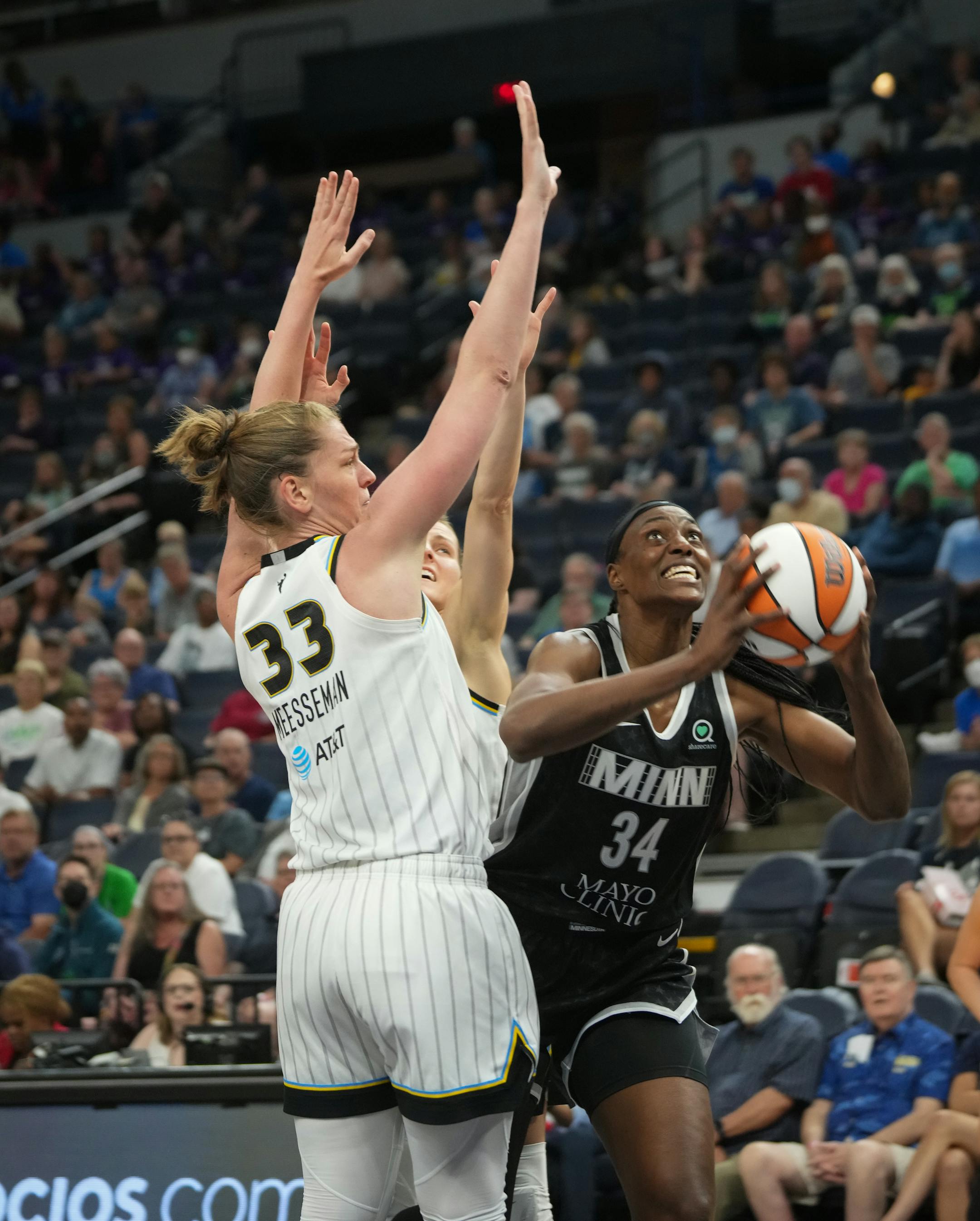 Minnesota Lynx center Sylvia Fowles (34) battles Chicago Sky forward Emma Meesseman (33) in the paint during the first half.