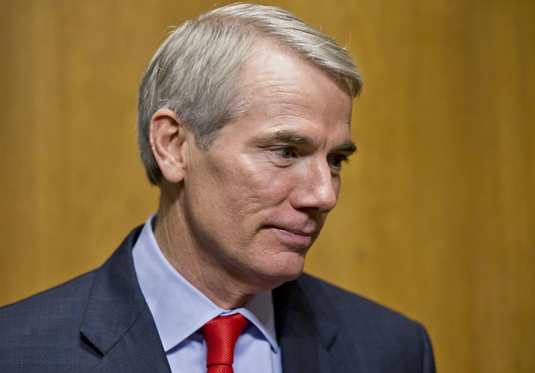 FILE - In this Nov. 6, 2013 file photo, Sen. Rob Portman, R-Ohio is seen on Capitol Hill in Washington. Their party has seized the Senate majority. Now, an ambitious class of Republican senators faces unique challenges and opportunities in a GOP-led Senate under new pressure to govern amid the 2016 presidential race. (AP Photo/J. Scott Applewhite, File)